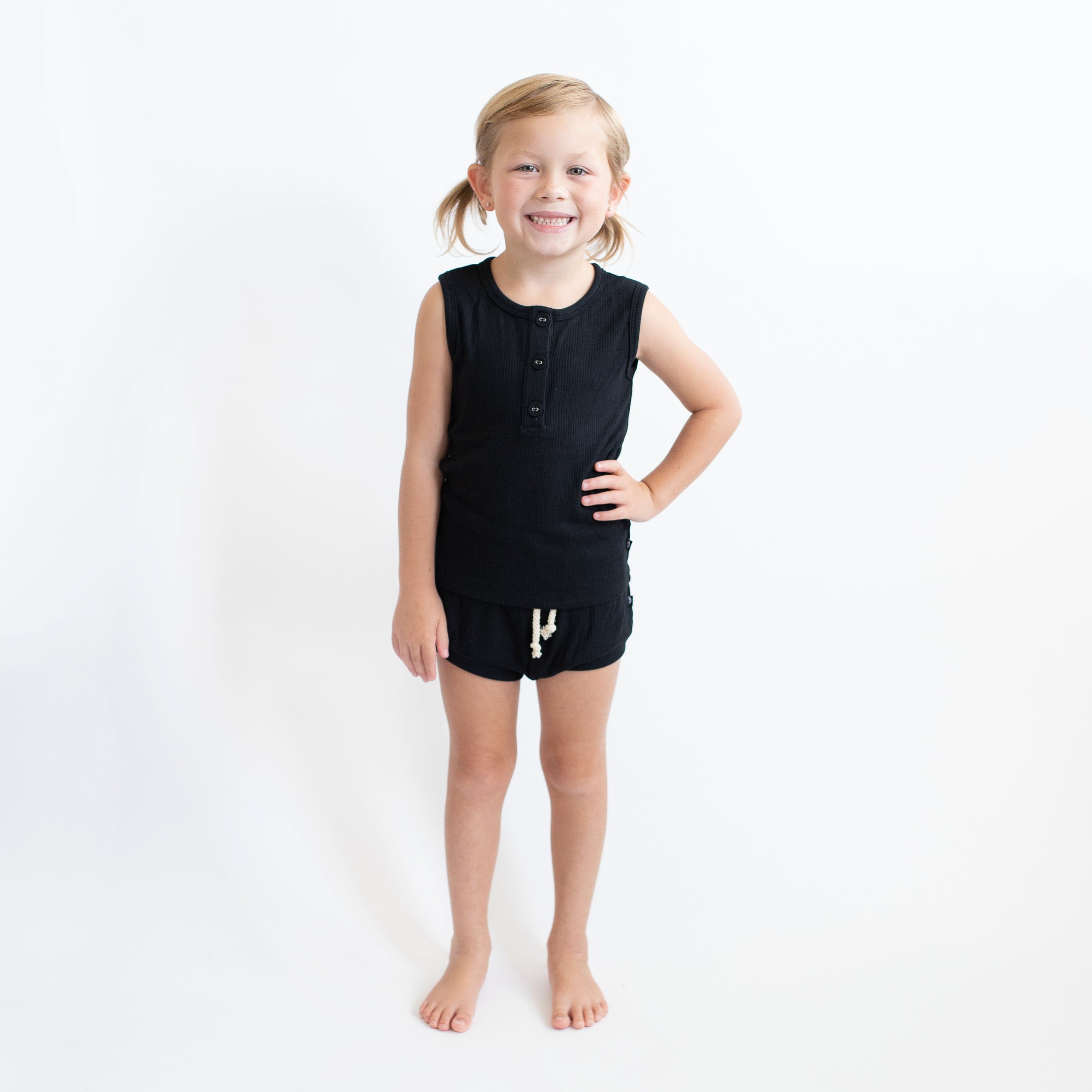 Child wearing Kyte Baby Ribbed Henley Tank Set in Midnight