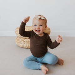 Infant Wearing Kyte Baby Ribbed Leggings in Slate