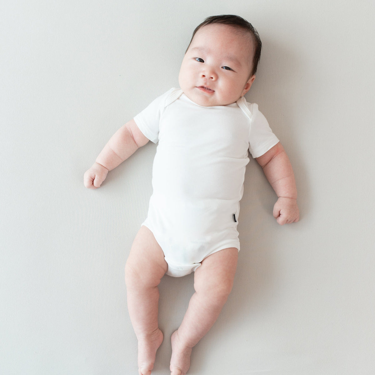 Kyte Baby Short Sleeve Bodysuits Bodysuit in Cloud