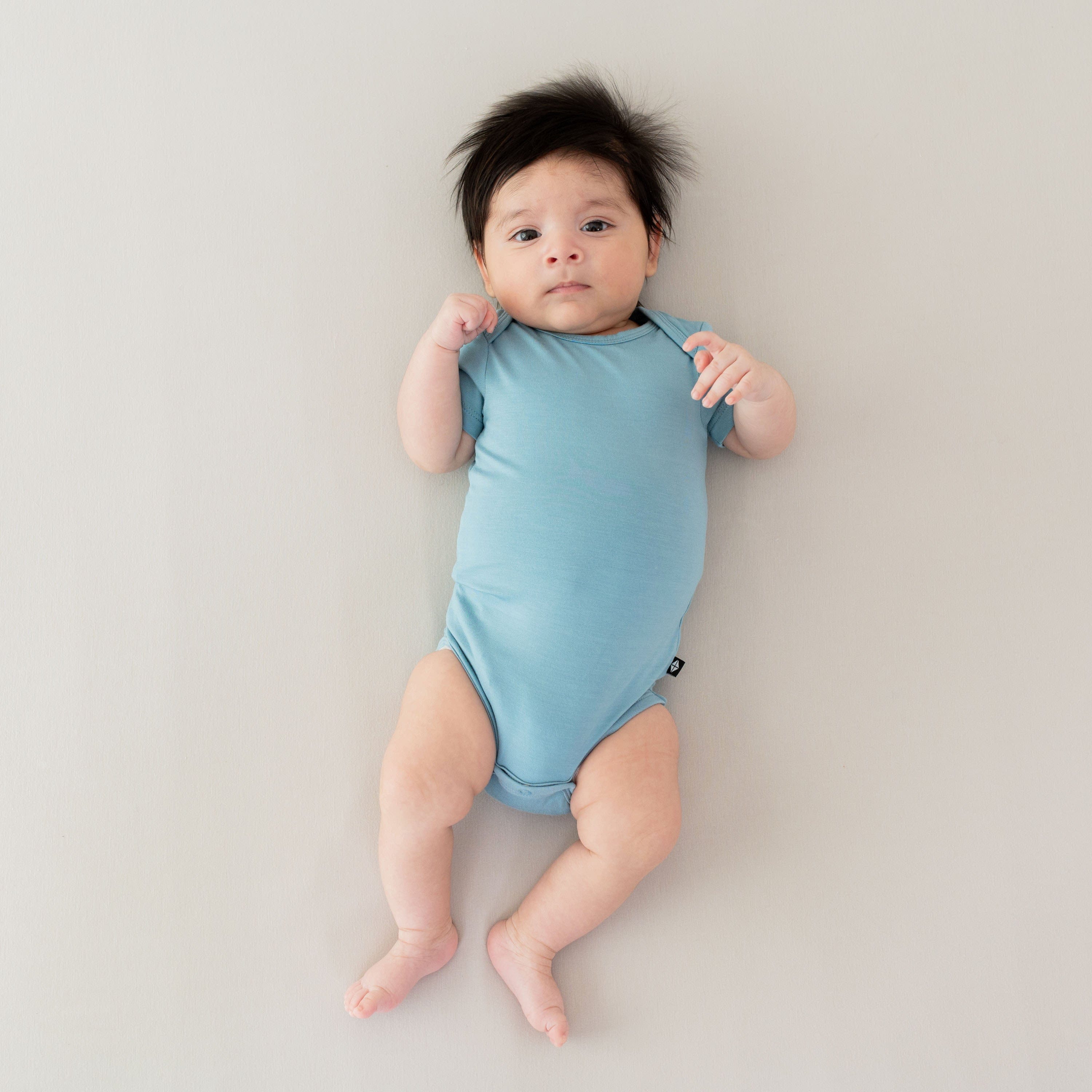 Kyte Baby Short Sleeve Bodysuits Bodysuit in Dusty Blue