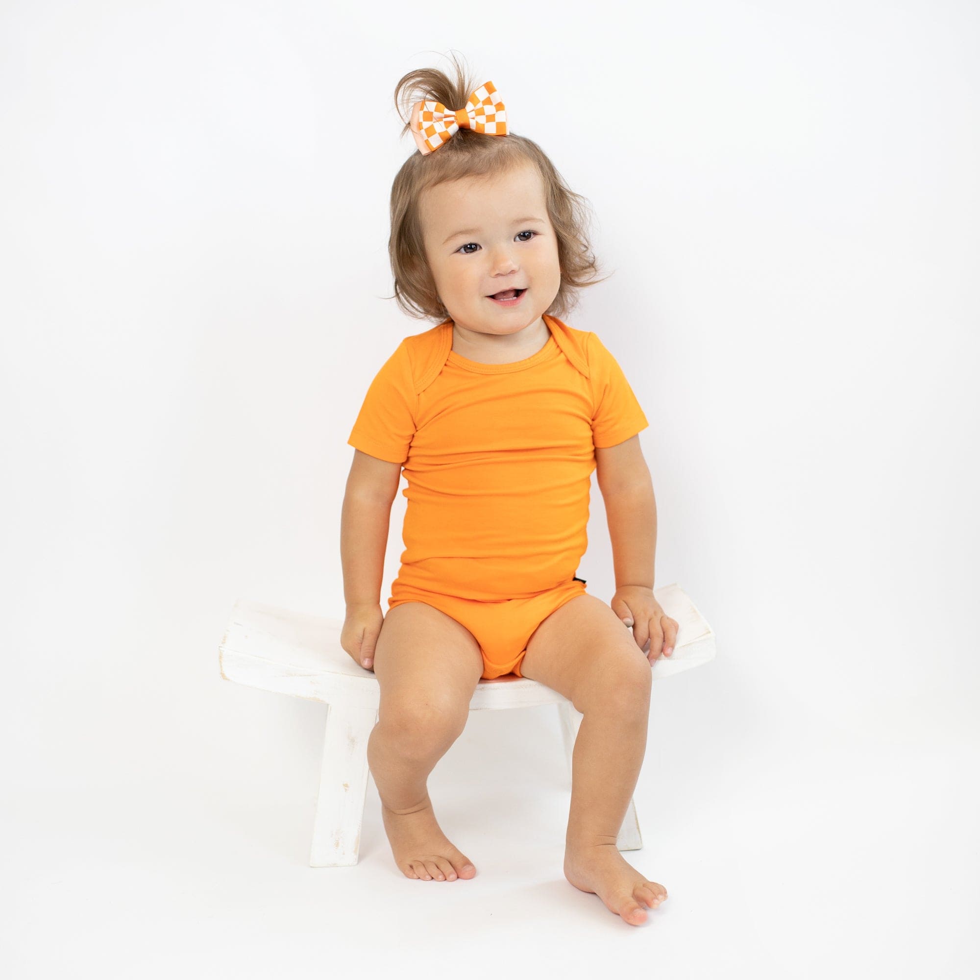 Kyte Baby Short Sleeve Bodysuits Bodysuit in Tangerine