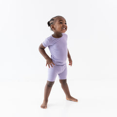 Child wearing two piece Short Sleeve Pajamas in Taro