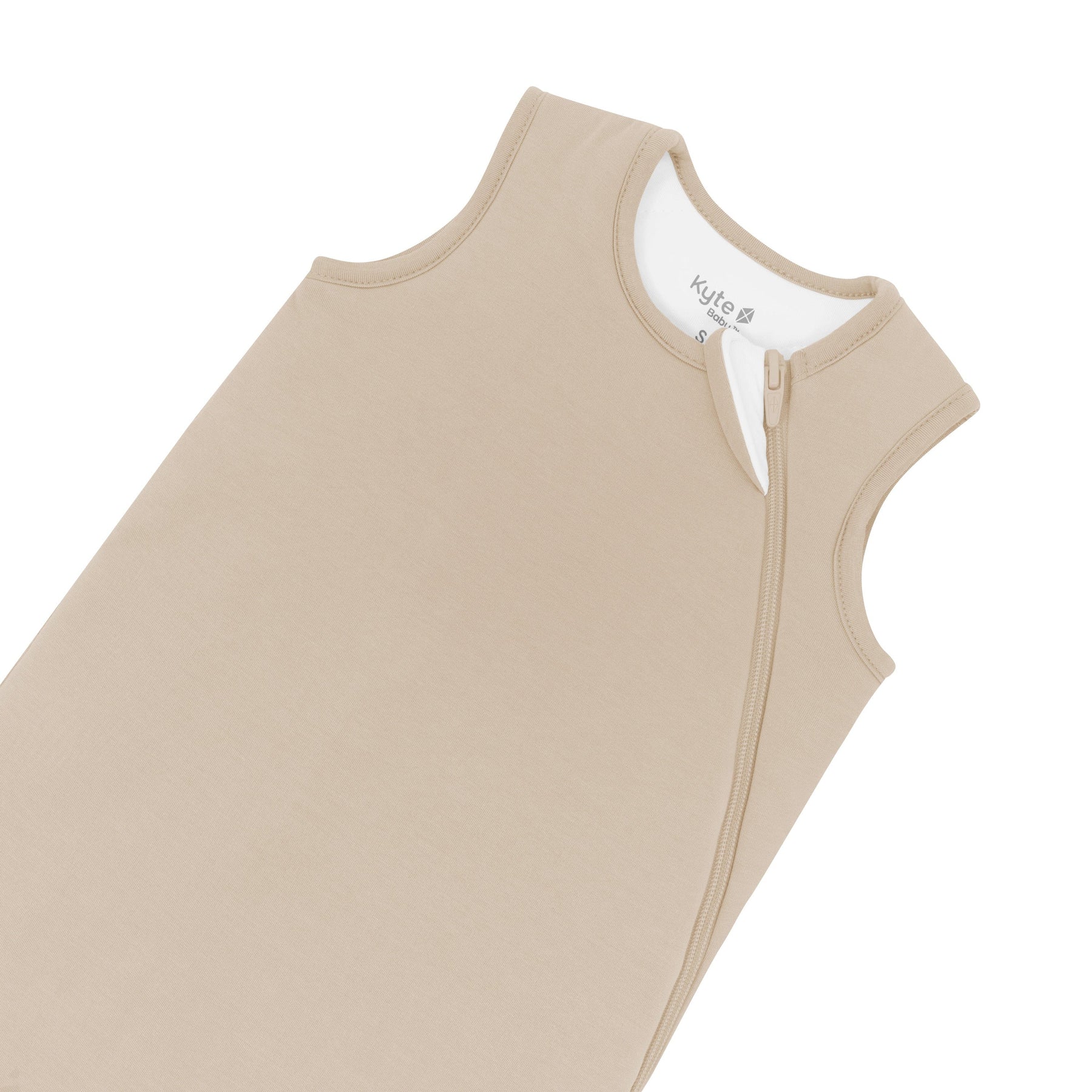 Kyte Baby Sleep Bag in Almond 1.0 showing zipper garage