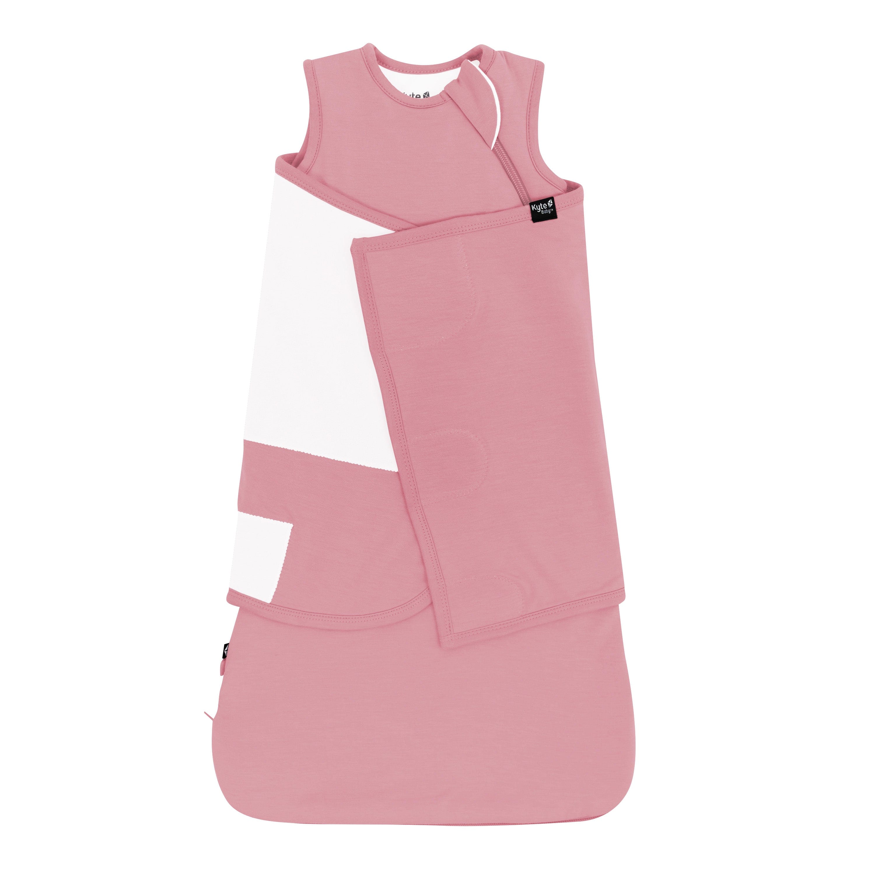 Kyte Baby bamboo Sleep Bag Swaddler in Apple Blossom with removable band shown swaddled