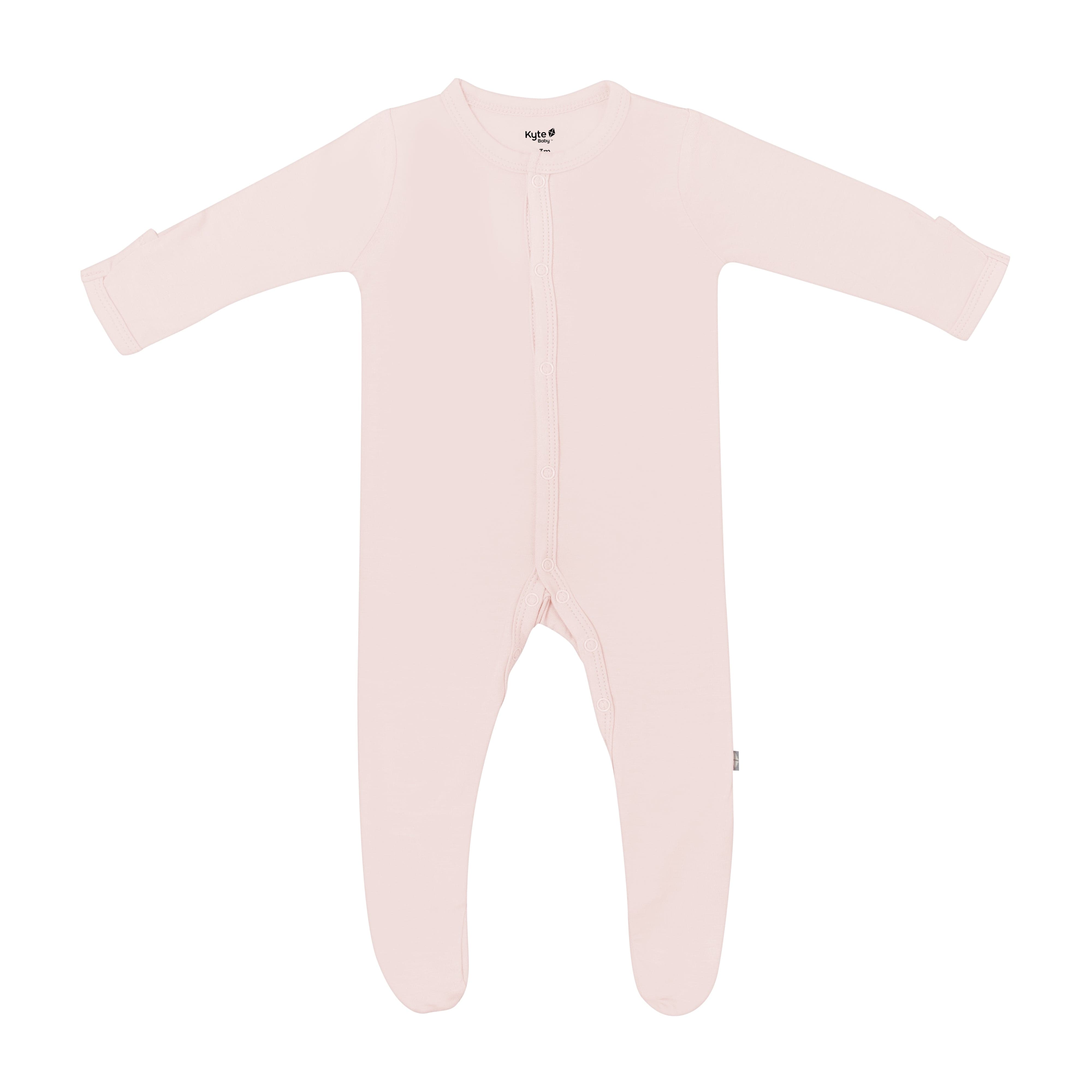 Flat lay of Kyte Baby footie in Blush