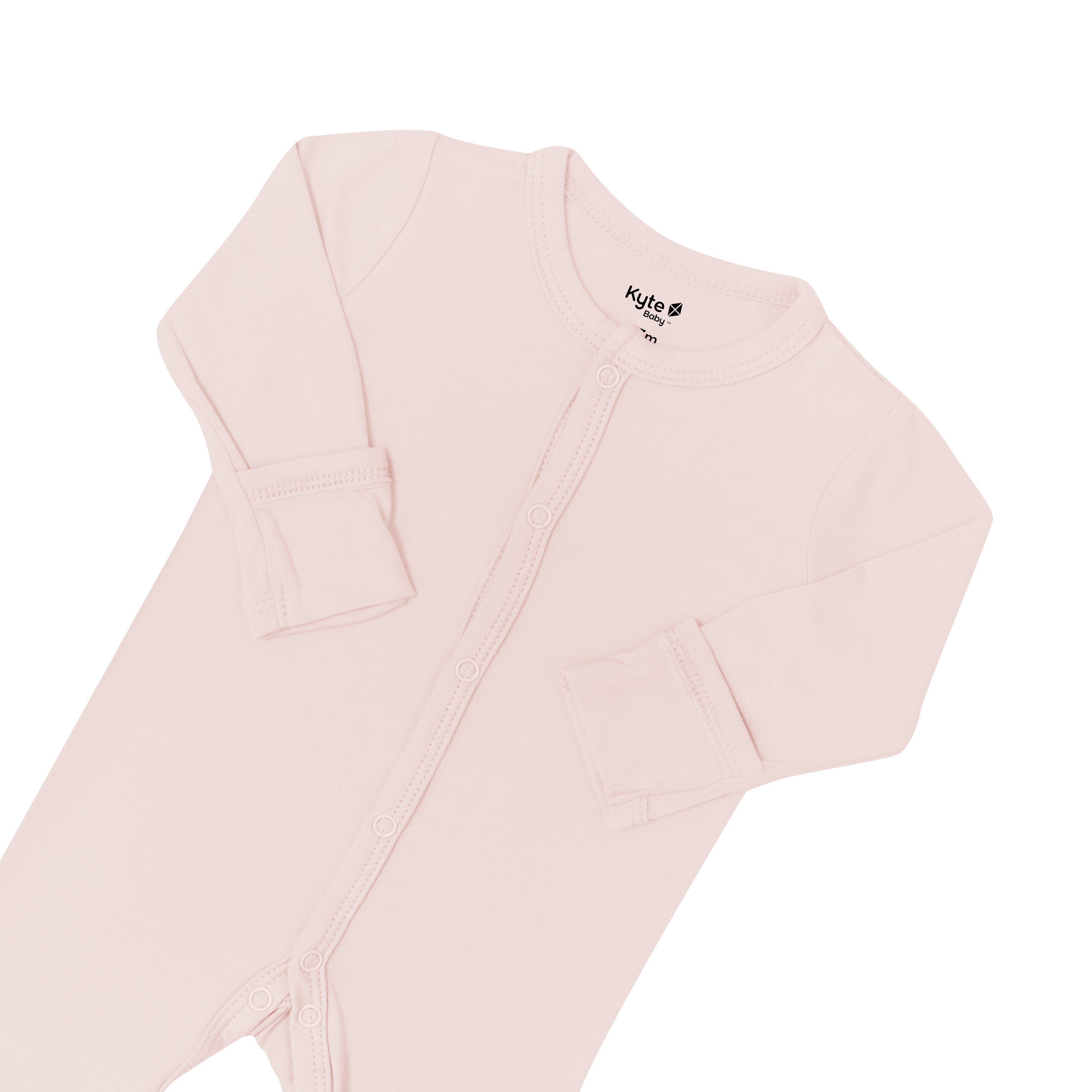 Foldover cuffs on Kyte Baby Footie in Blush