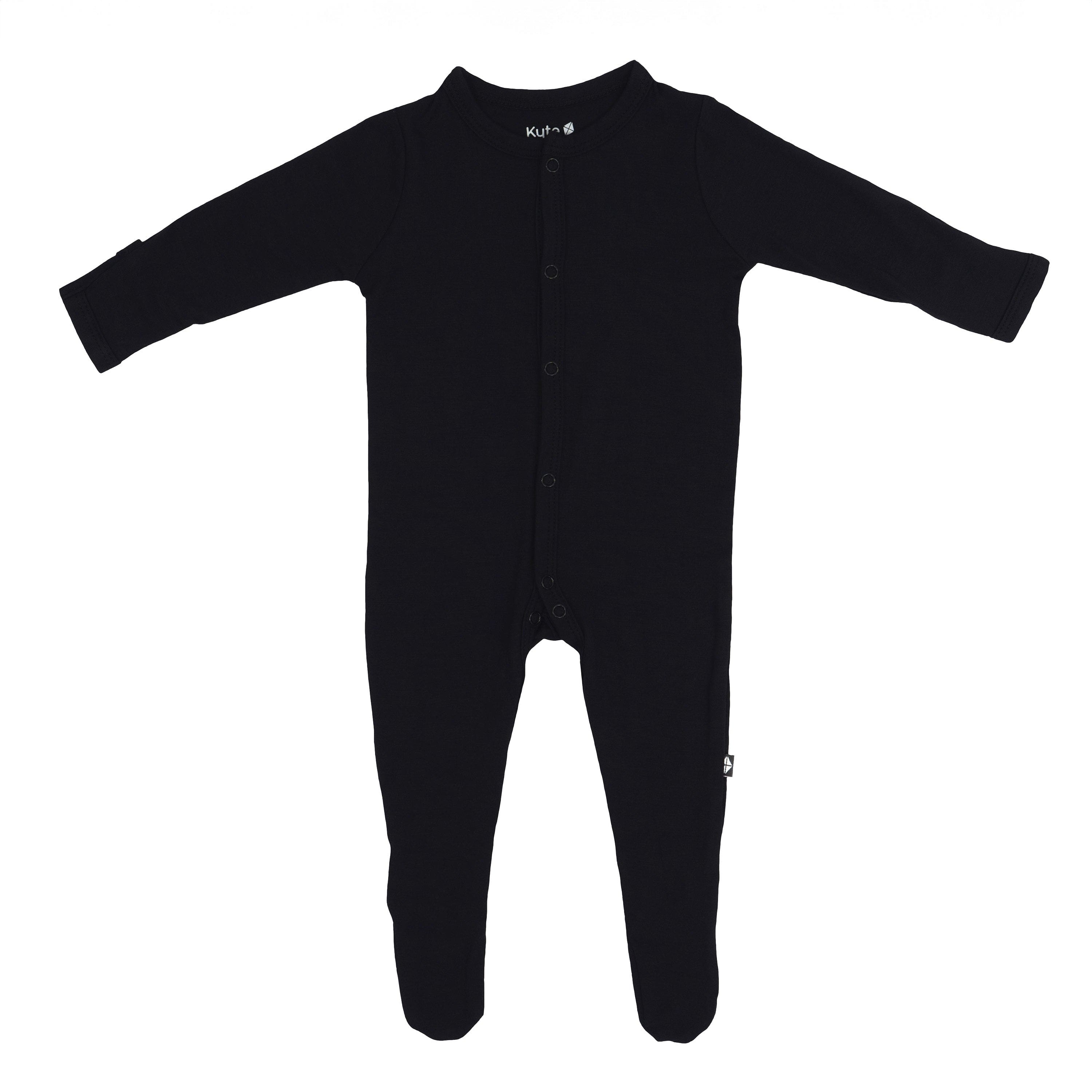 Flat lay of Kyte Baby Footie in Midnight