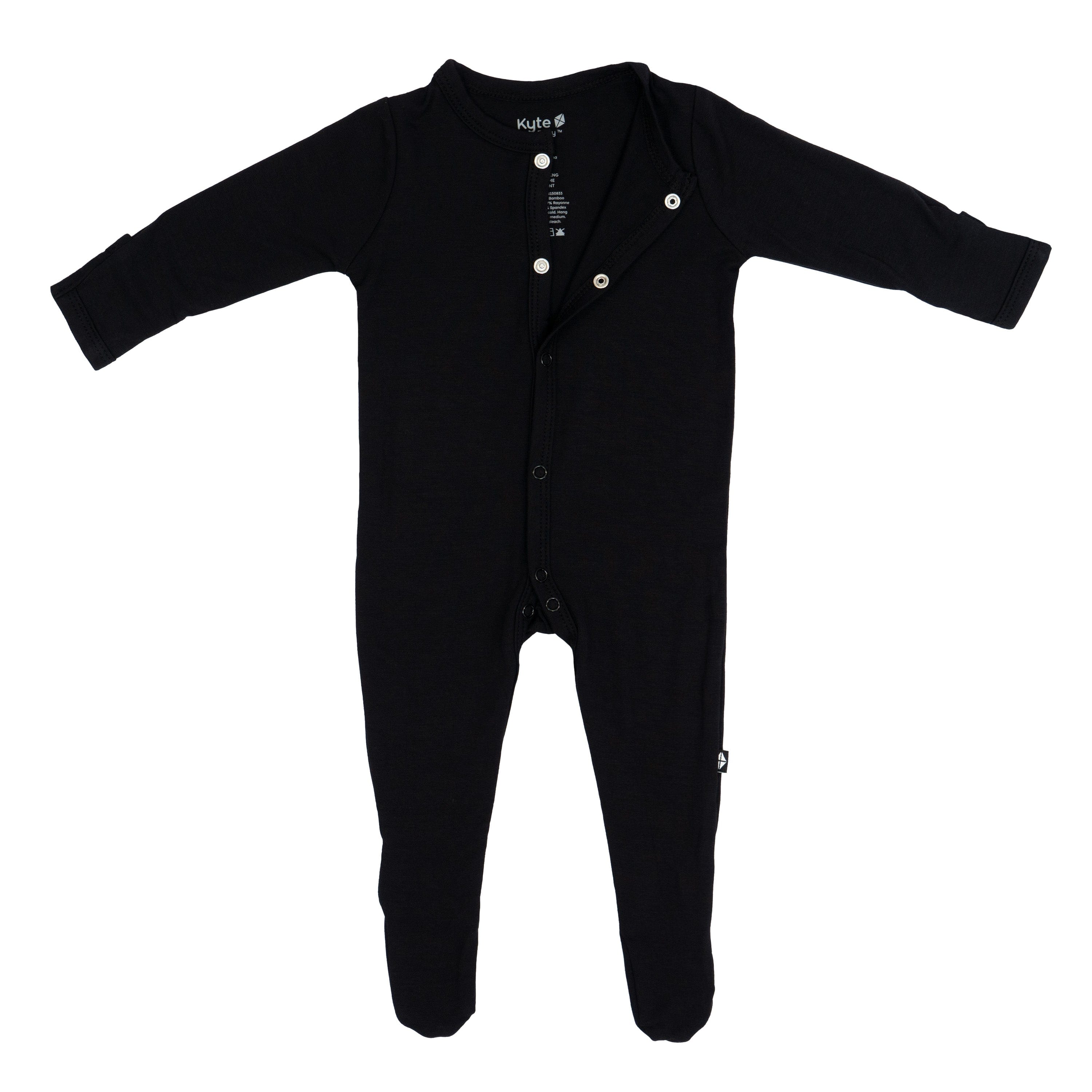 Partially unsnapped Kyte Baby Footie in Midnight