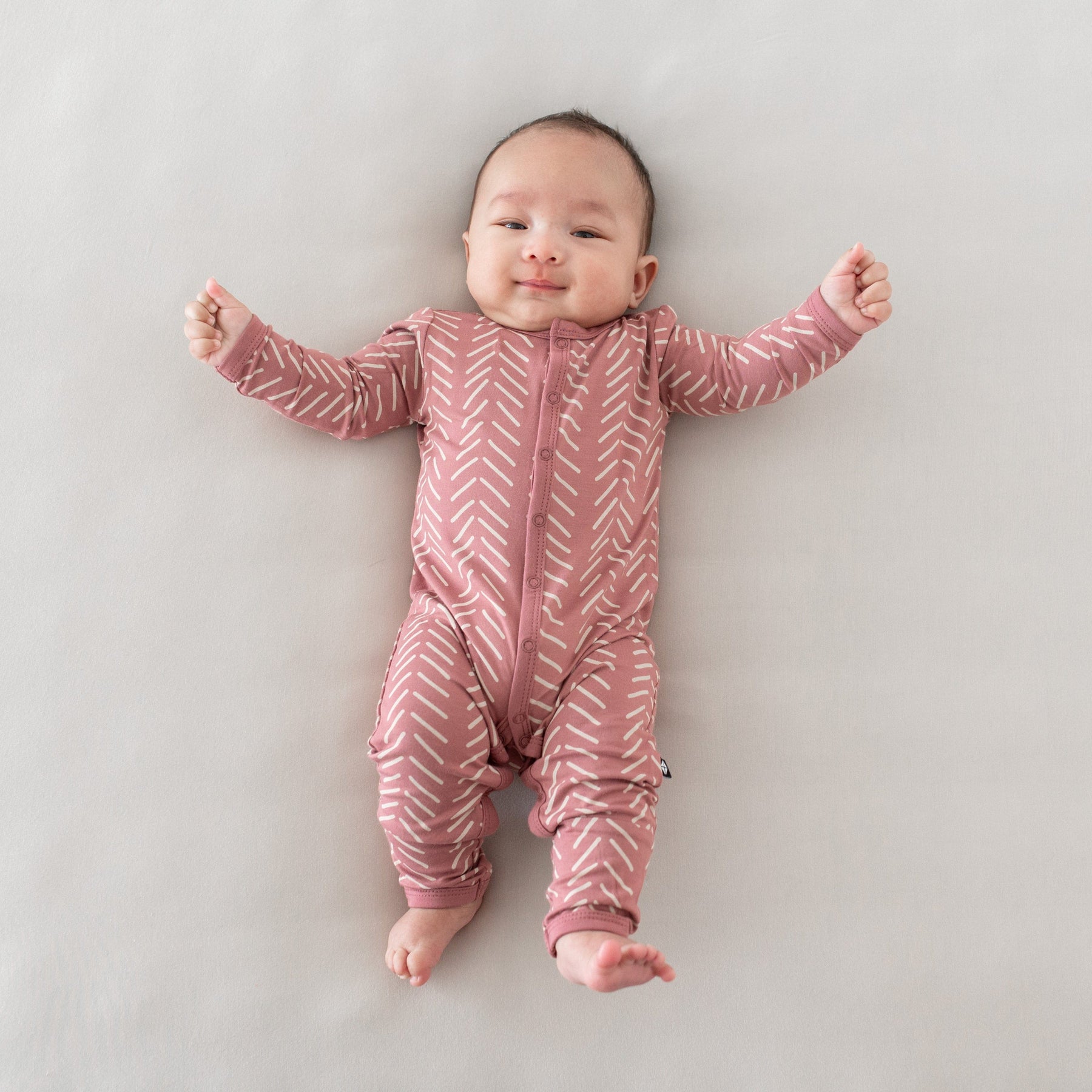 Kyte Baby Snap Romper Romper in Dusty Rose Herringbone