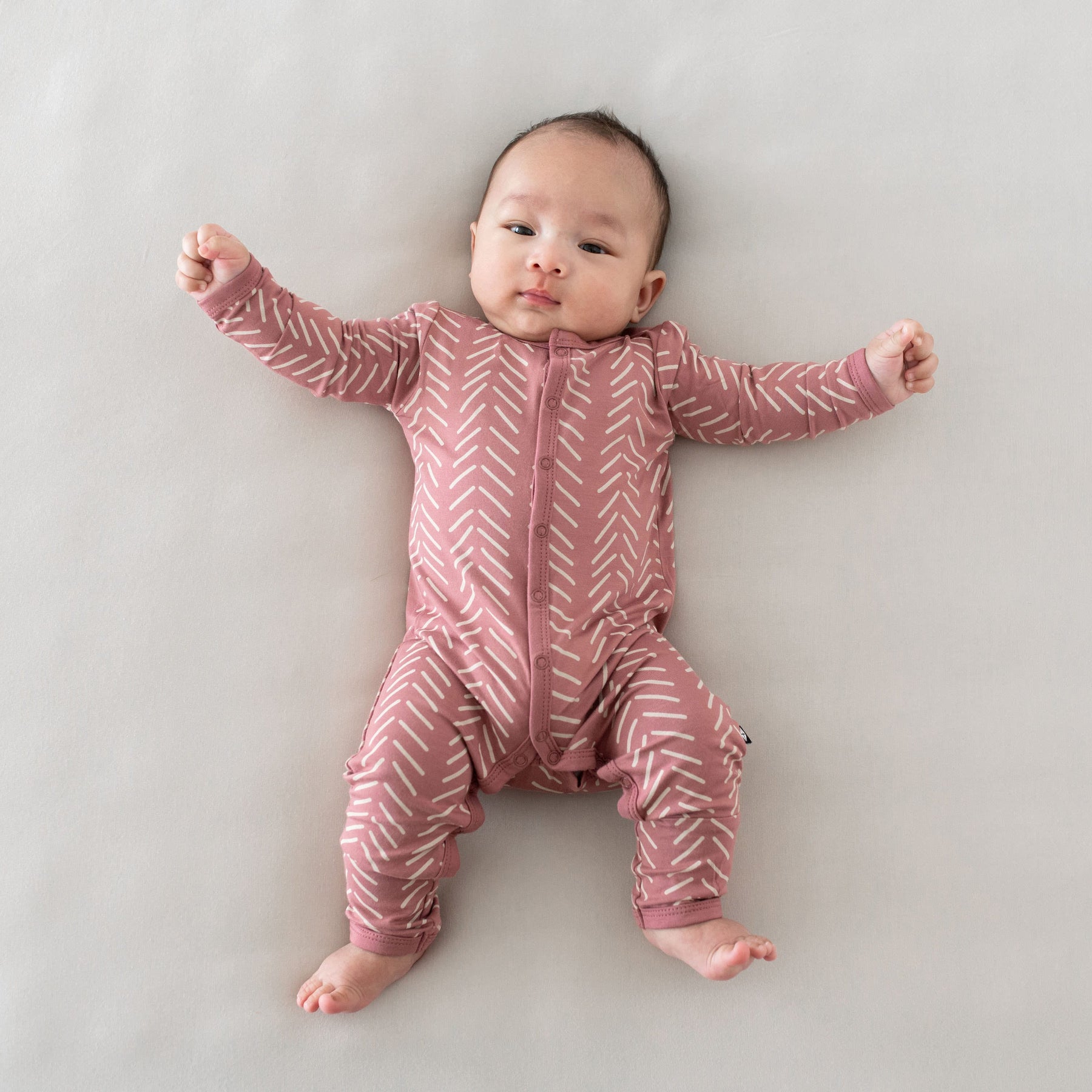 Kyte Baby Snap Romper Romper in Dusty Rose Herringbone