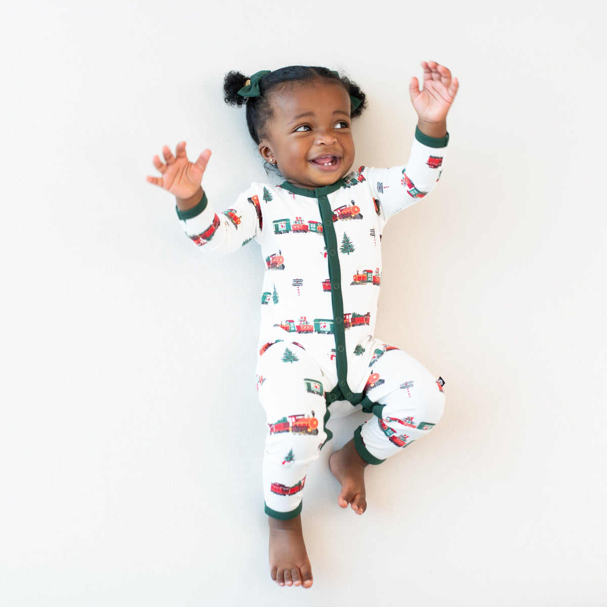 Kyte Baby Snap Romper Romper in Holiday Train