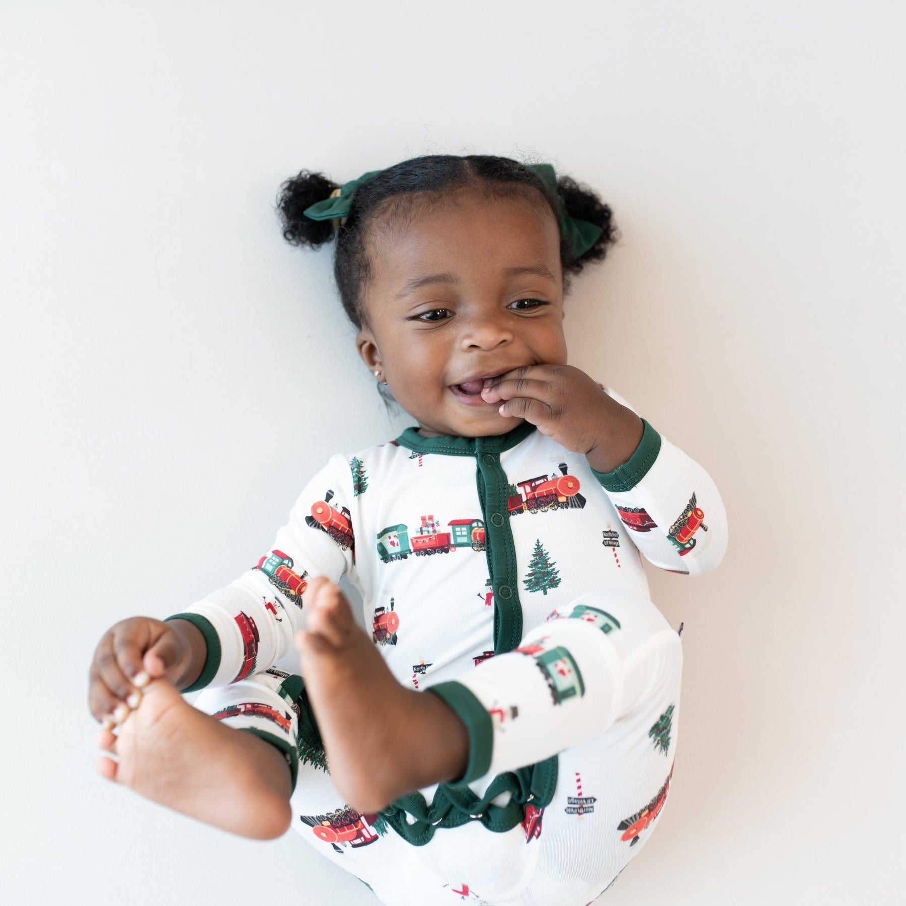 Kyte Baby Snap Romper Romper in Holiday Train