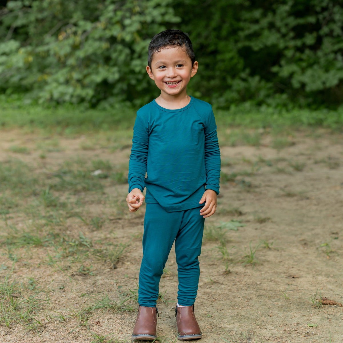 Toddler wearing Kyte Baby Long Sleeve Pajamas in Loch