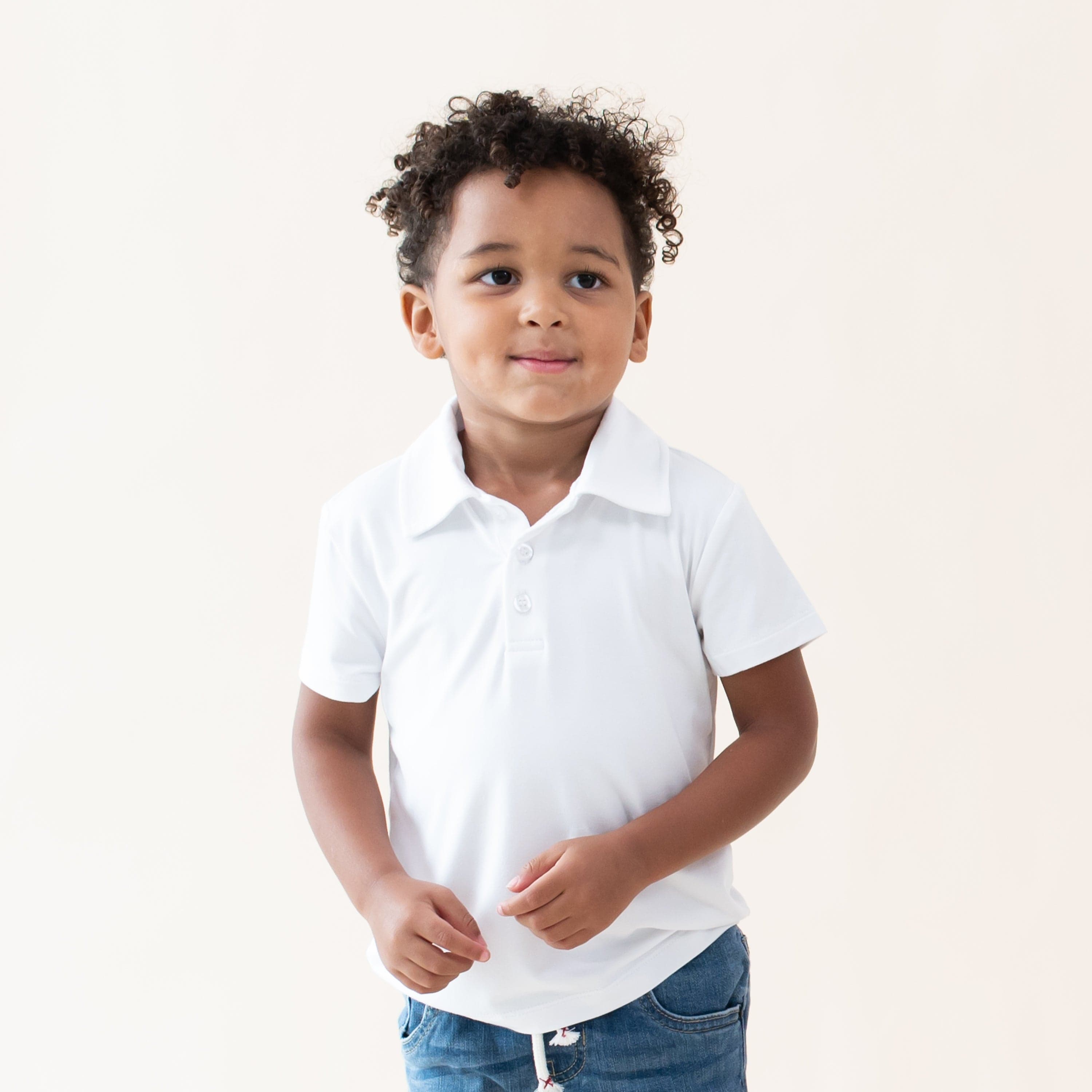 Toddler wearing Kyte Baby Short Sleeve Polo in Snow