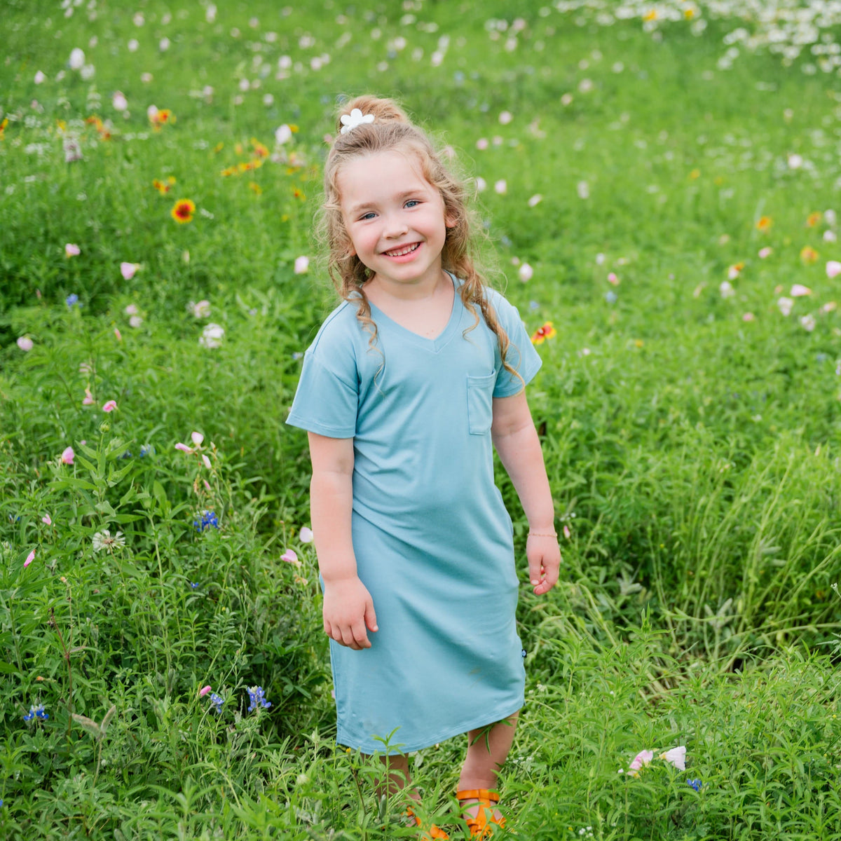 Girl wearing Kyte Baby Toddler T-Shirt Dress in Dusty Blue