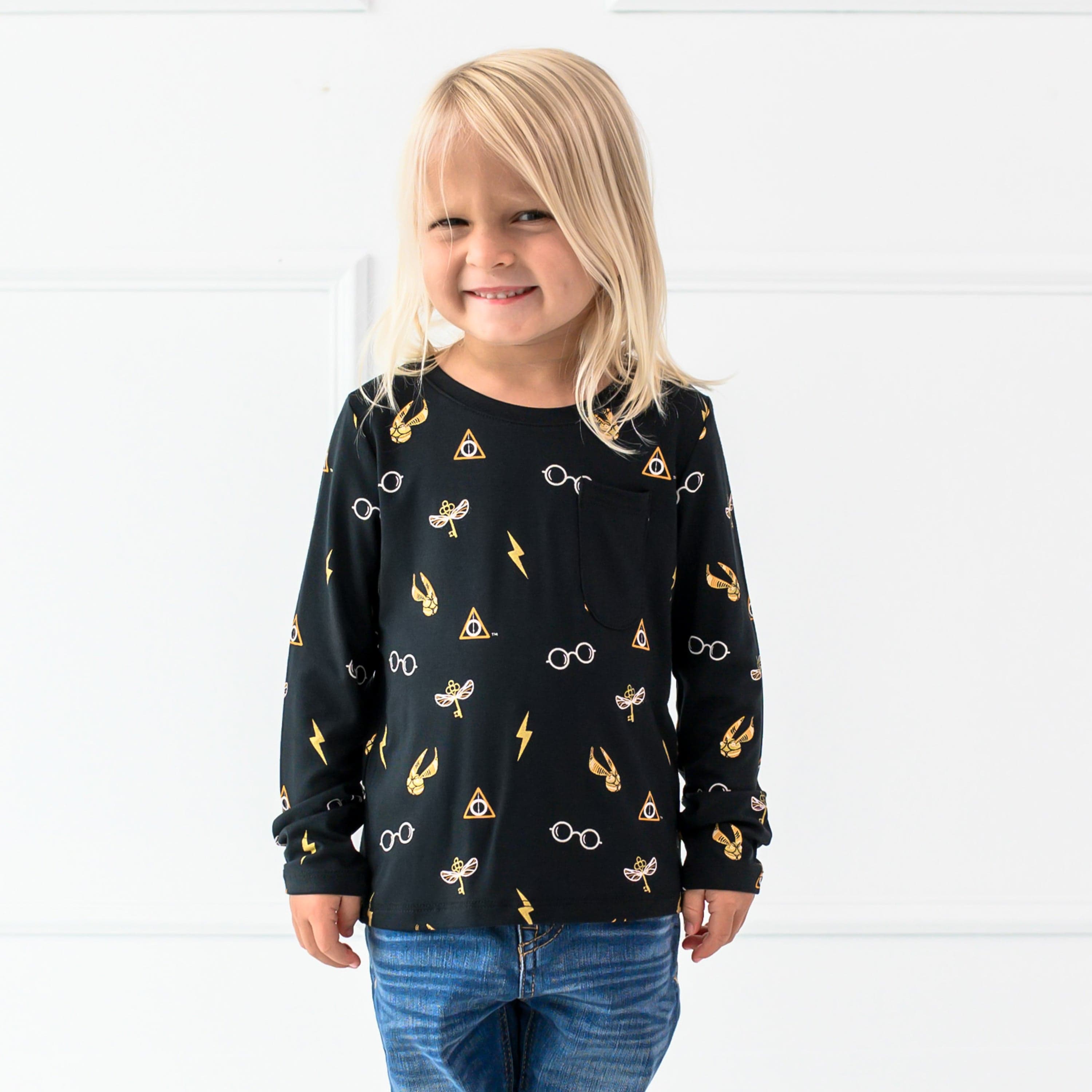 Toddler wearing Kyte Baby bamboo Long Sleeve Toddler Crew Neck Tee in Midnight Icon