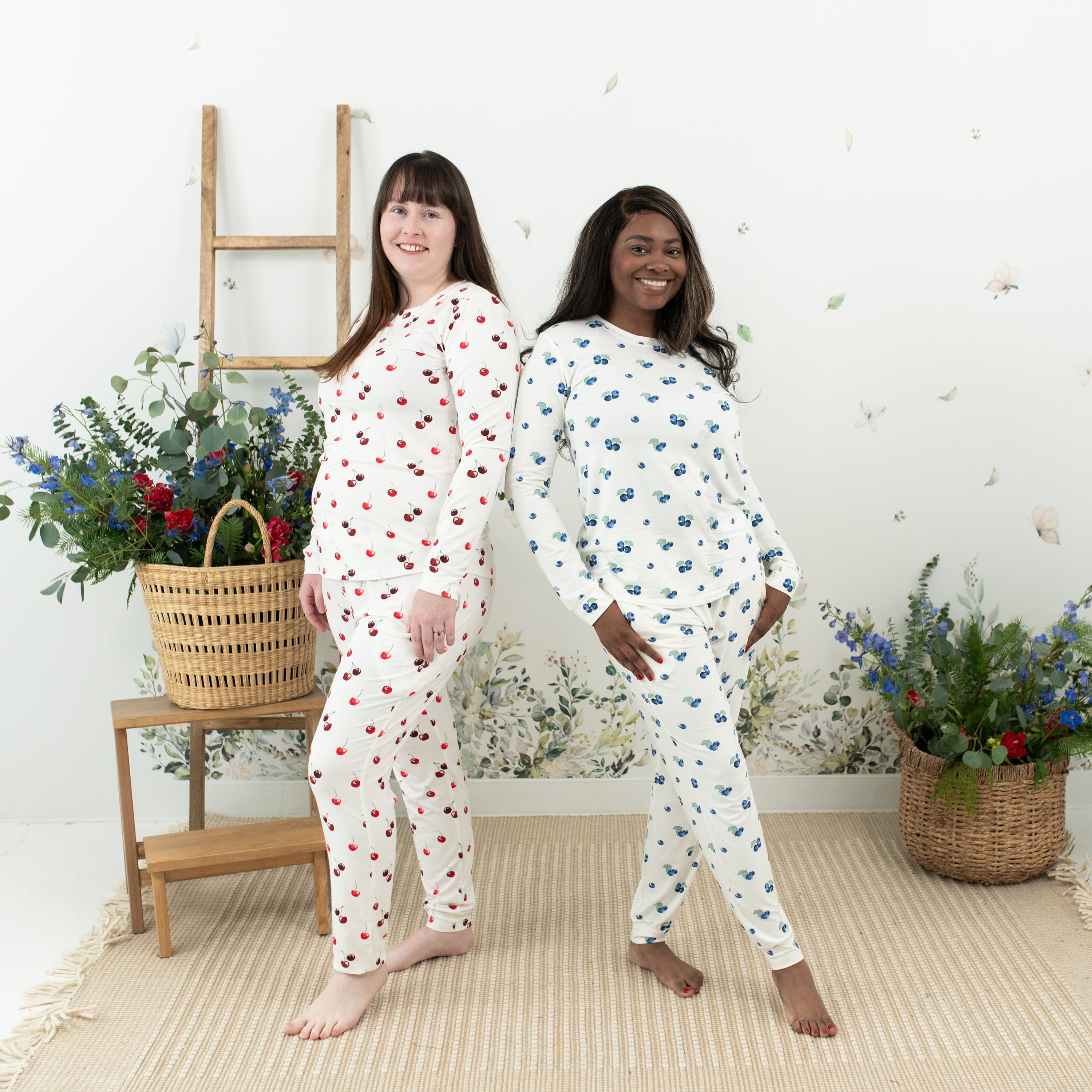 Women wearing Kyte Baby women's jogger pajama sets