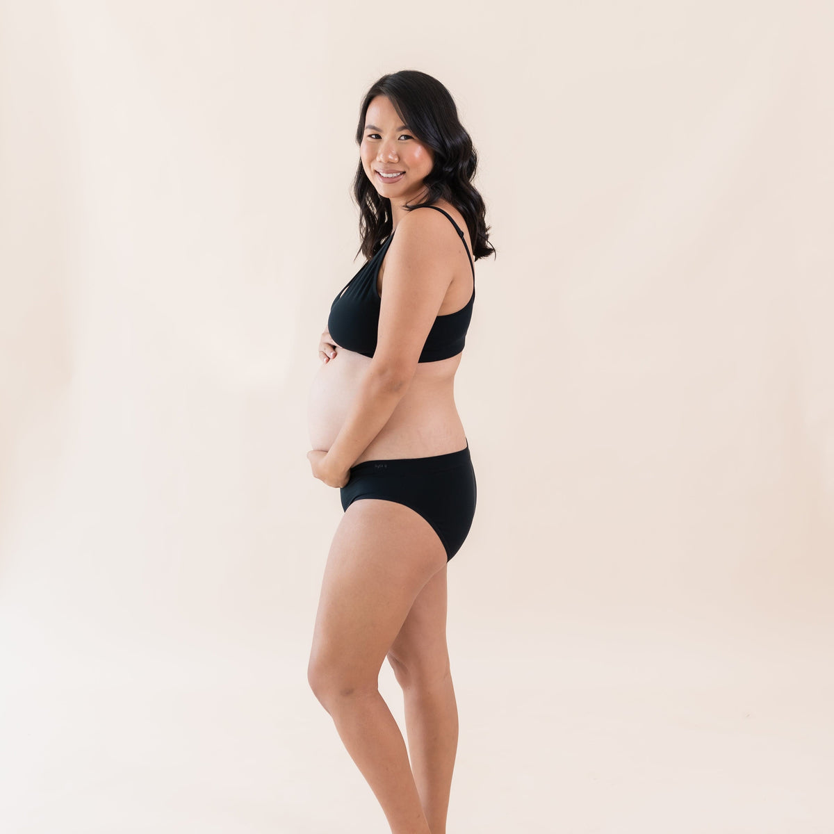 Woman wearing Kyte Baby Women's Midi Brief Underwear in Midnight
