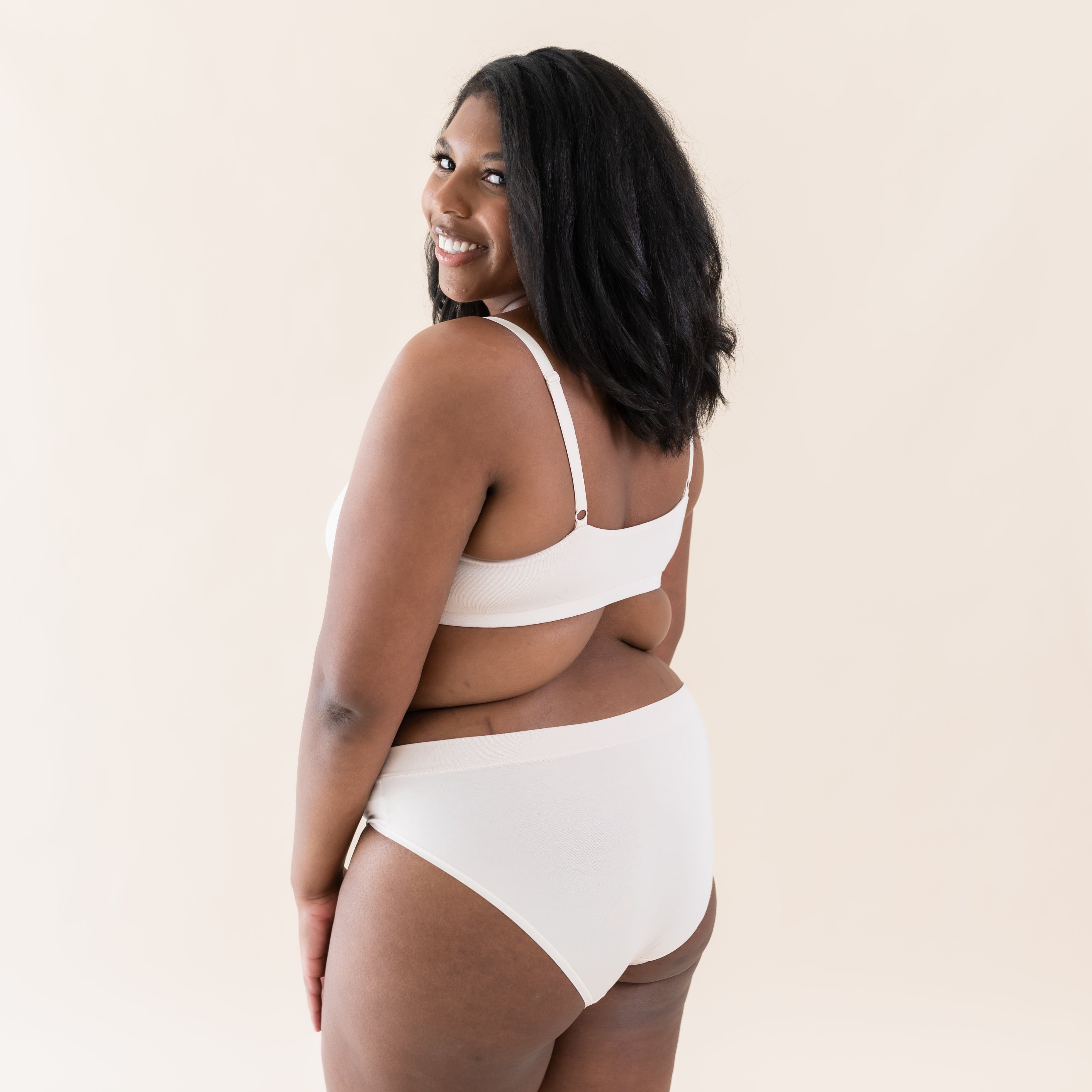 Woman wearing Kyte Baby Women's Midi Brief in Blonde