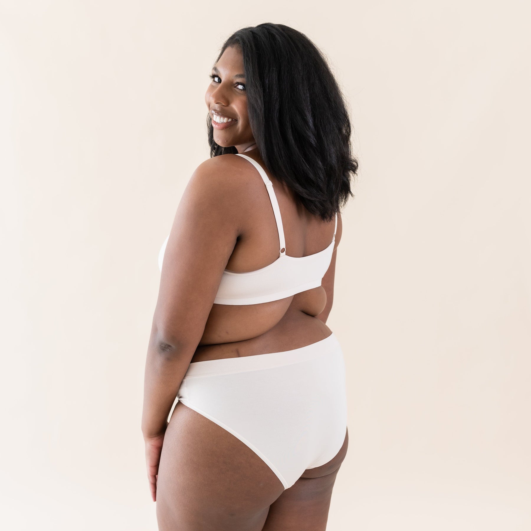 Woman wearing Kyte Baby Women's Midi Brief in Blonde