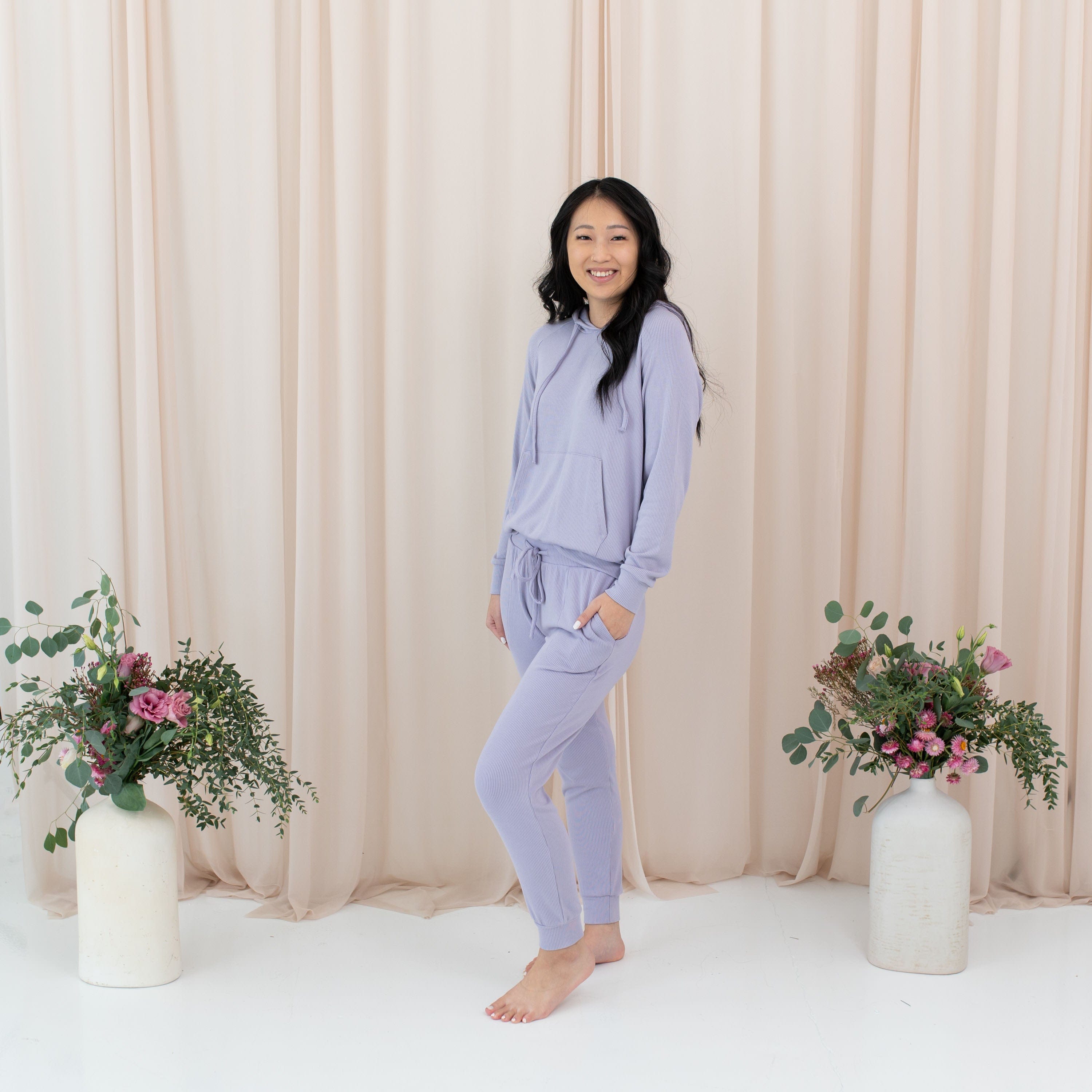 Woman wearing Kyte Baby Women's Ribbed Jogger Pant in Taro