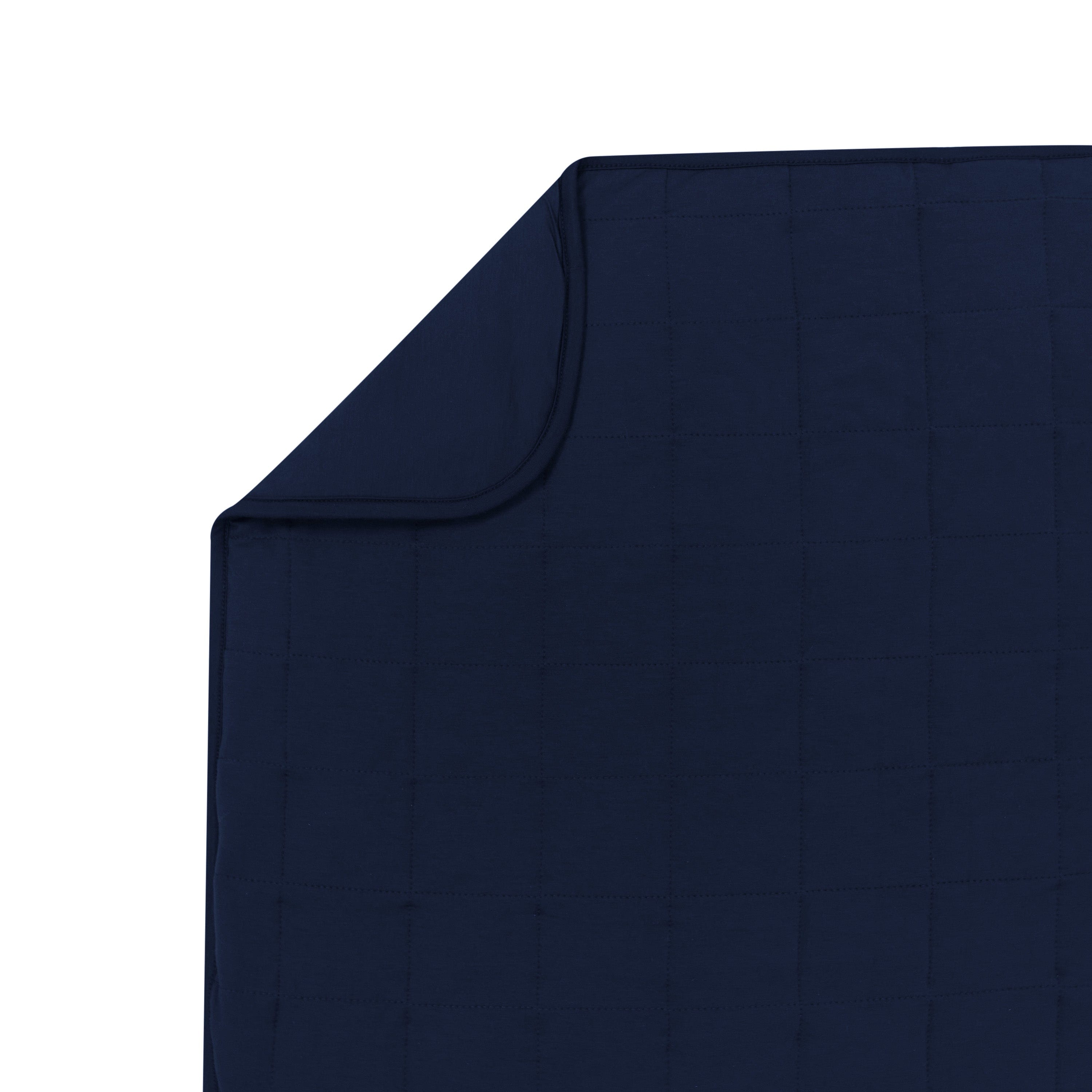 Quilted bamboo Kyte Baby Youth Blanket in Navy 2.5