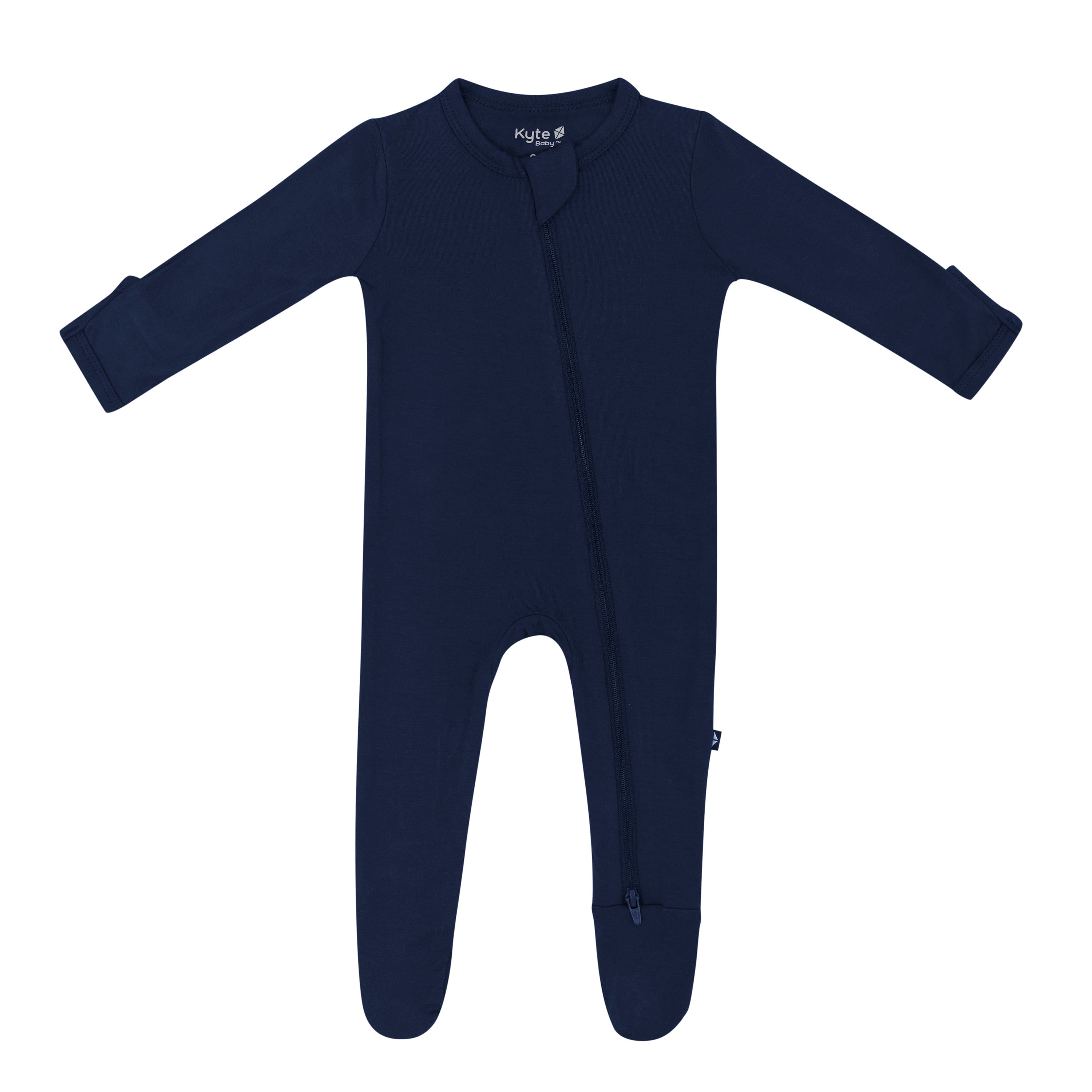 Flat lay of Kyte Baby Zippered Footie in Navy