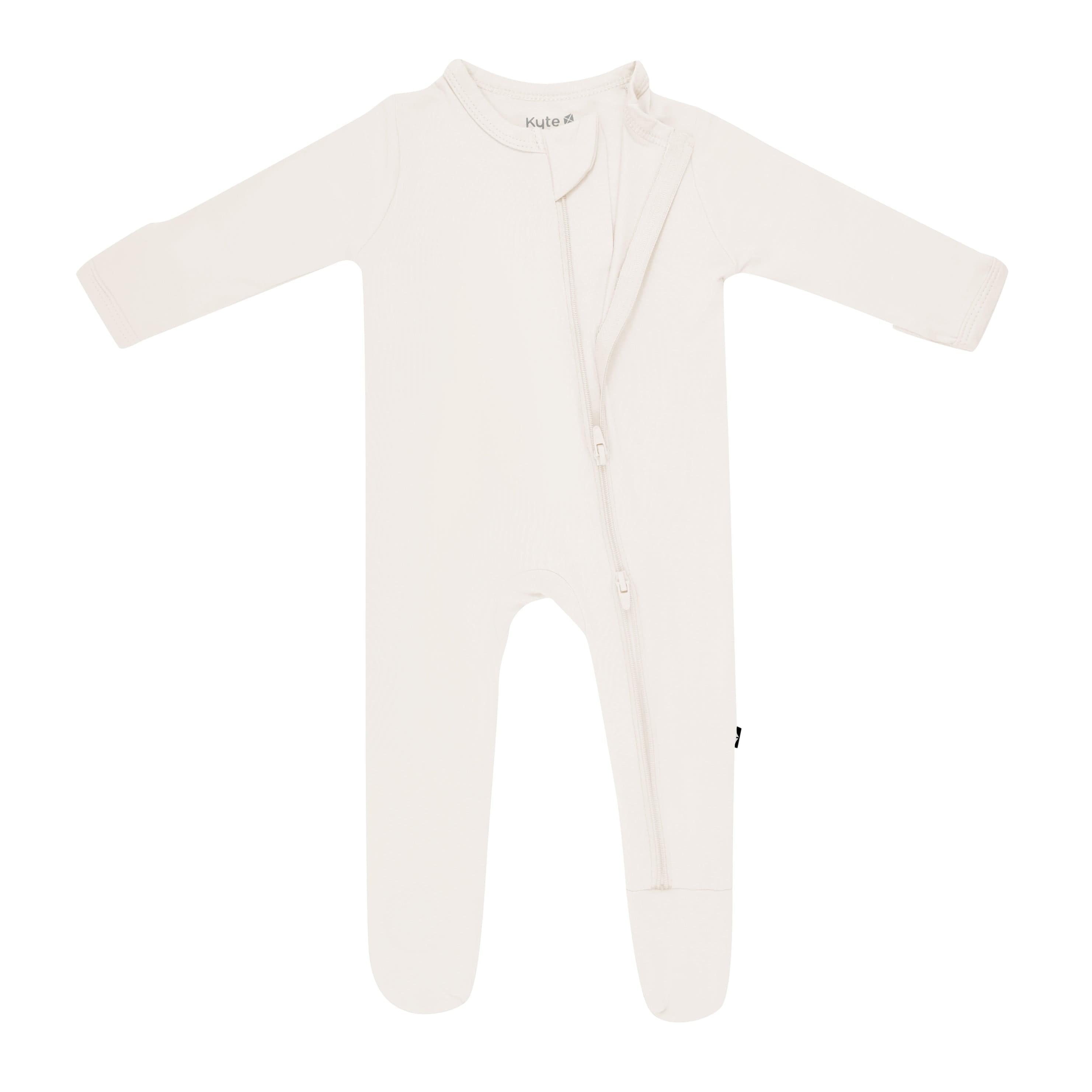 Dual zipper partially unzipped from the top on the Zippered Footie in Oat