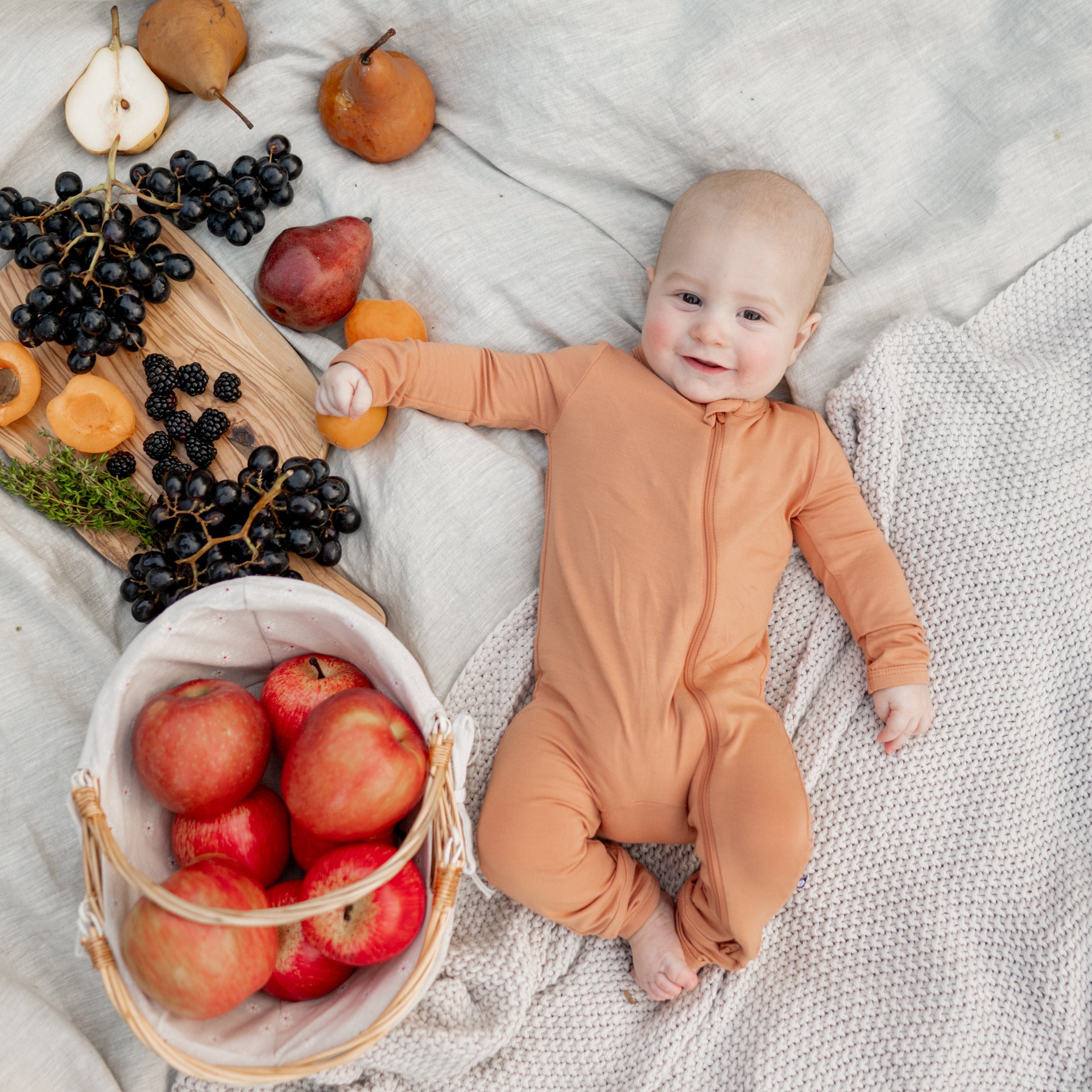 Kyte Baby Zippered Rompers Zippered Romper in Apricot