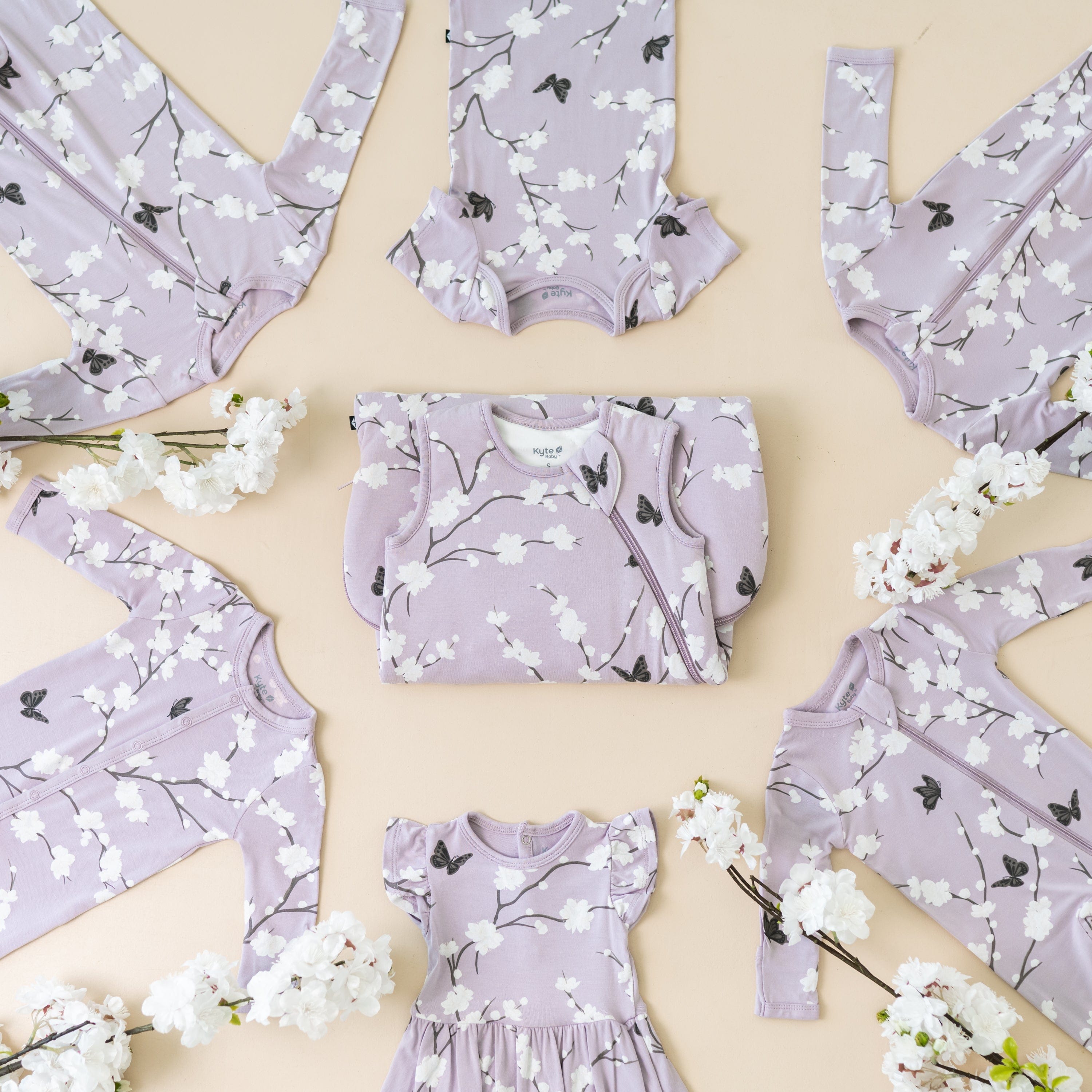 Kyte Baby Zippered Rompers Zippered Romper in Cherry Blossom
