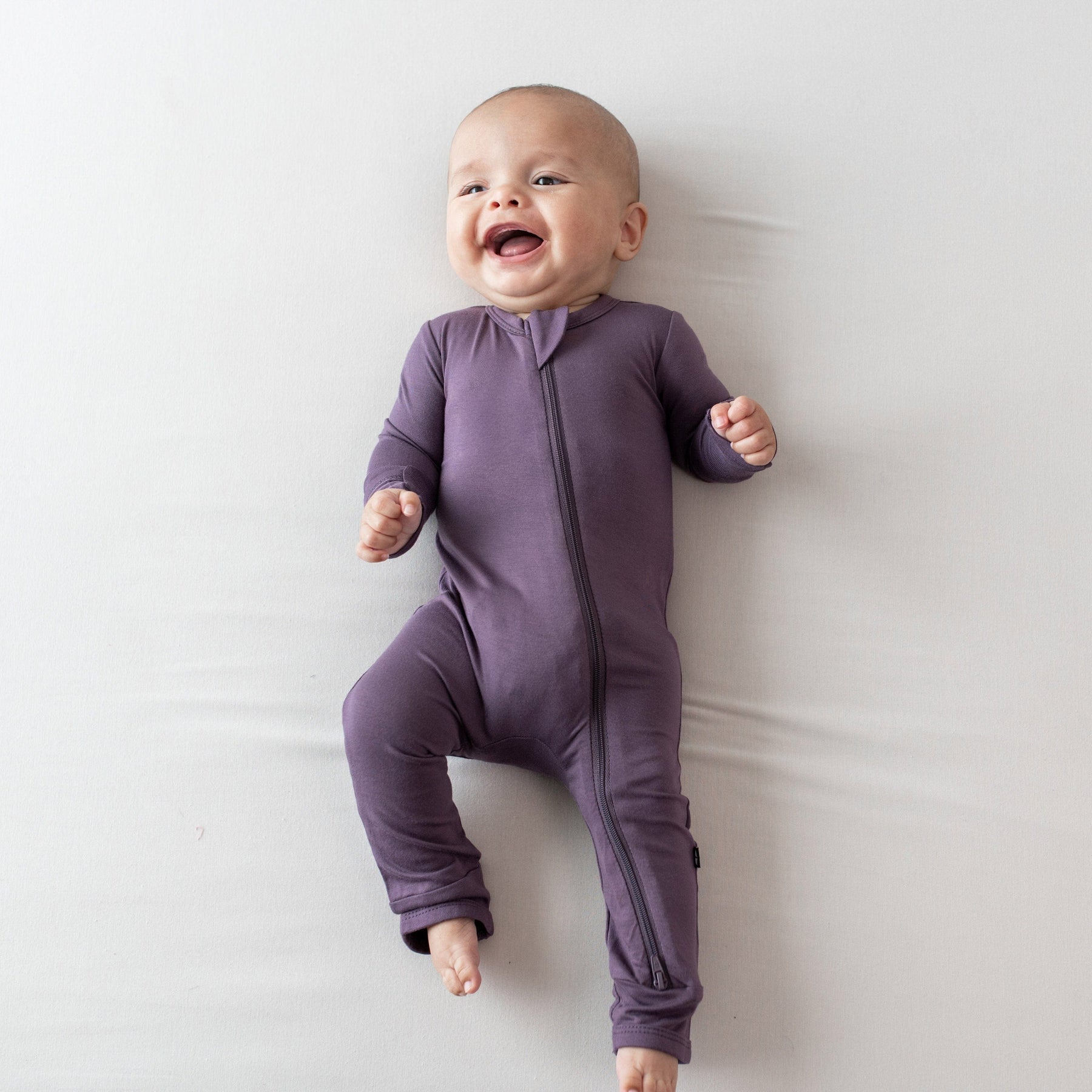 Kyte Baby Zippered Rompers Zippered Romper in Currant