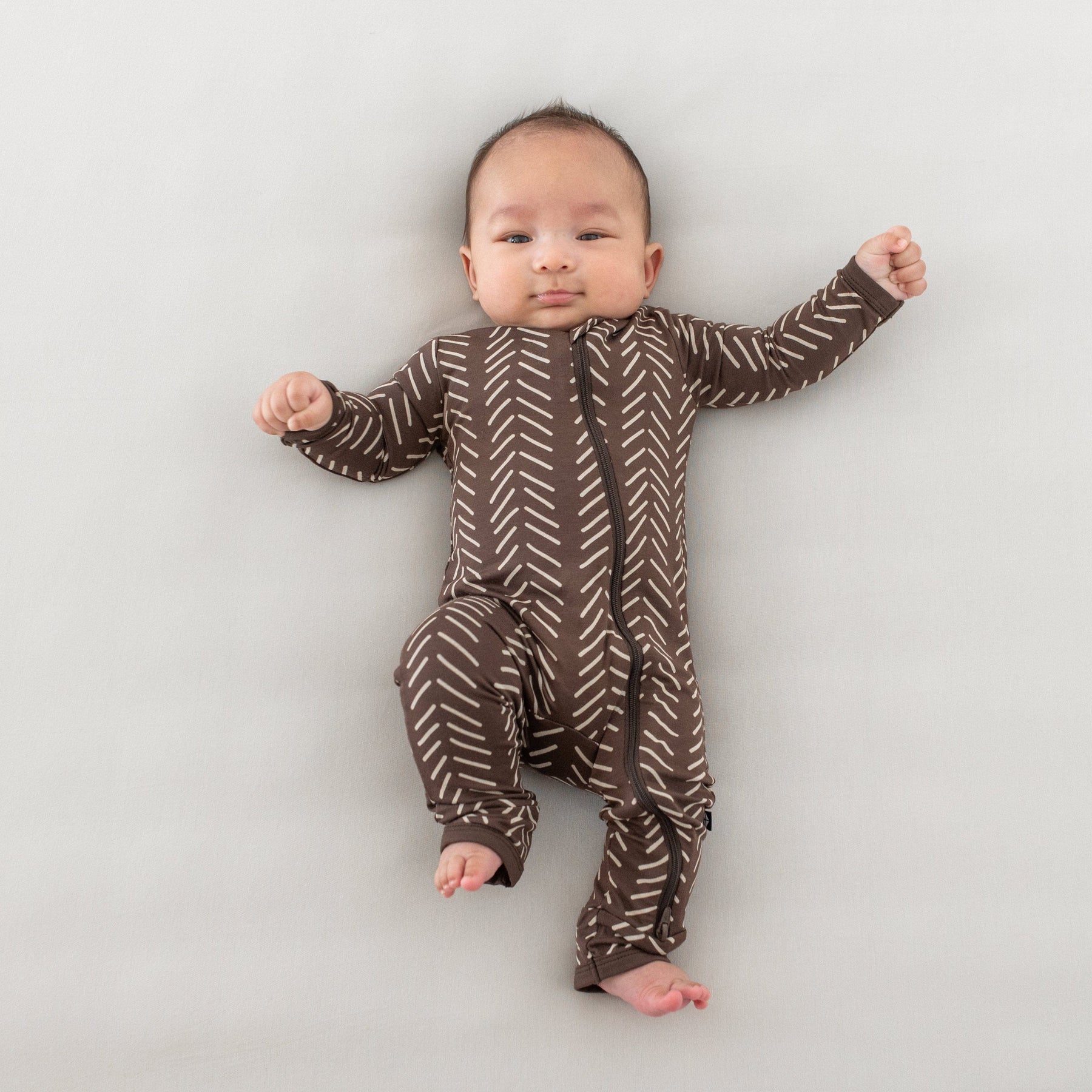 Kyte Baby Zippered Rompers Zippered Romper in Espresso Herringbone