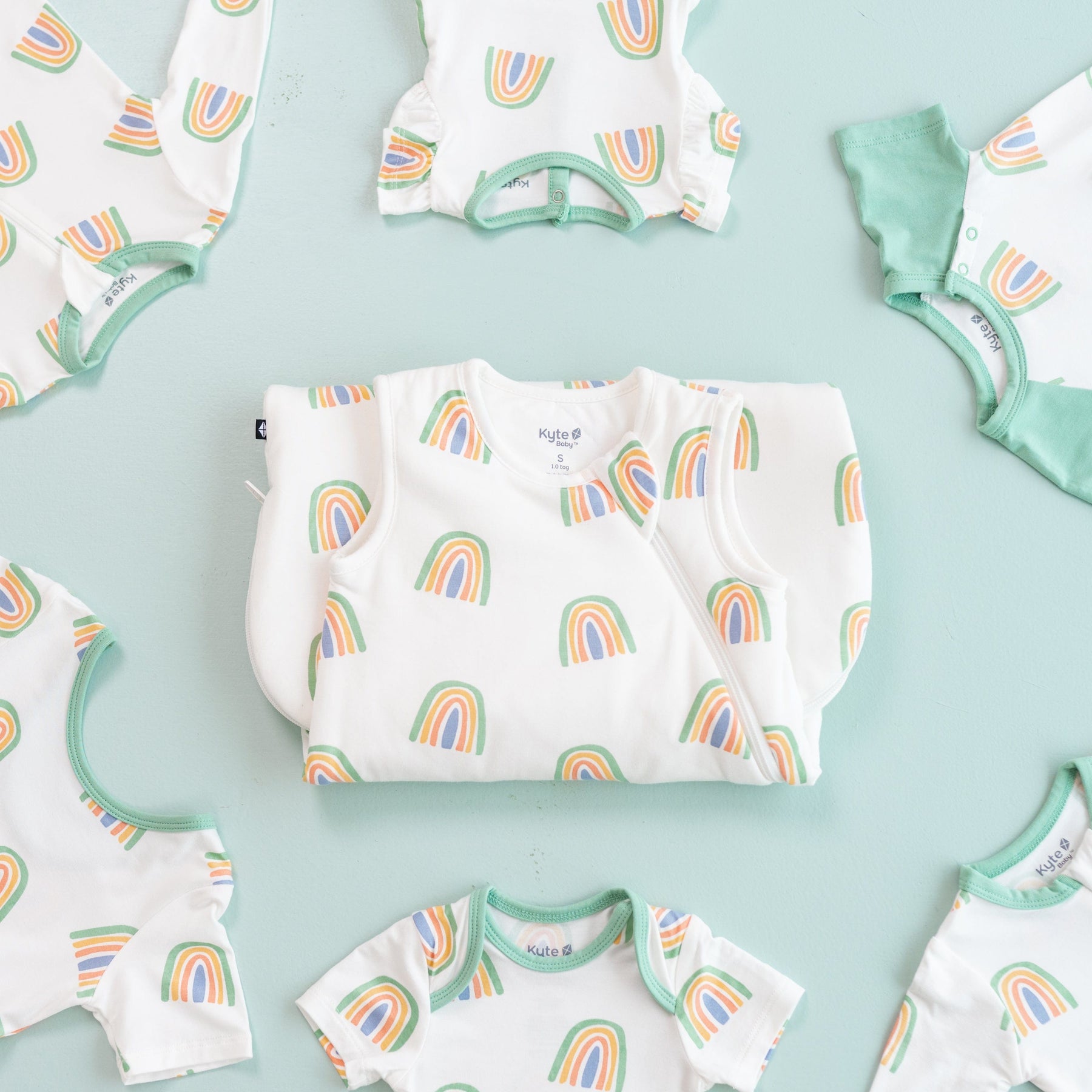 Kyte Baby selection of bamboo baby clothing and sleep bags in  Wasabi Rainbow
