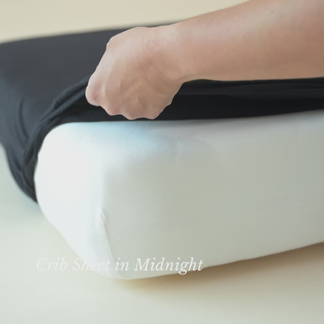 Video of Kyte Baby Crib Sheet in Midnight black