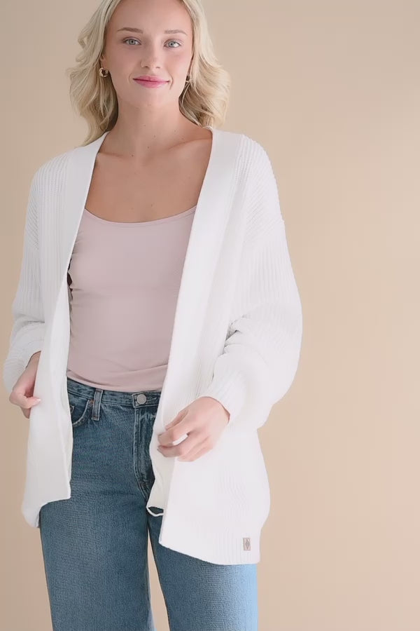Video of female modeling the Chunky Knit Women's Oversized Cardigan in Cloud
