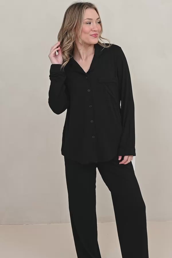 Video of female wearing the Long-Sleeved Women's Pajama Set in Midnight with Midnight Trim