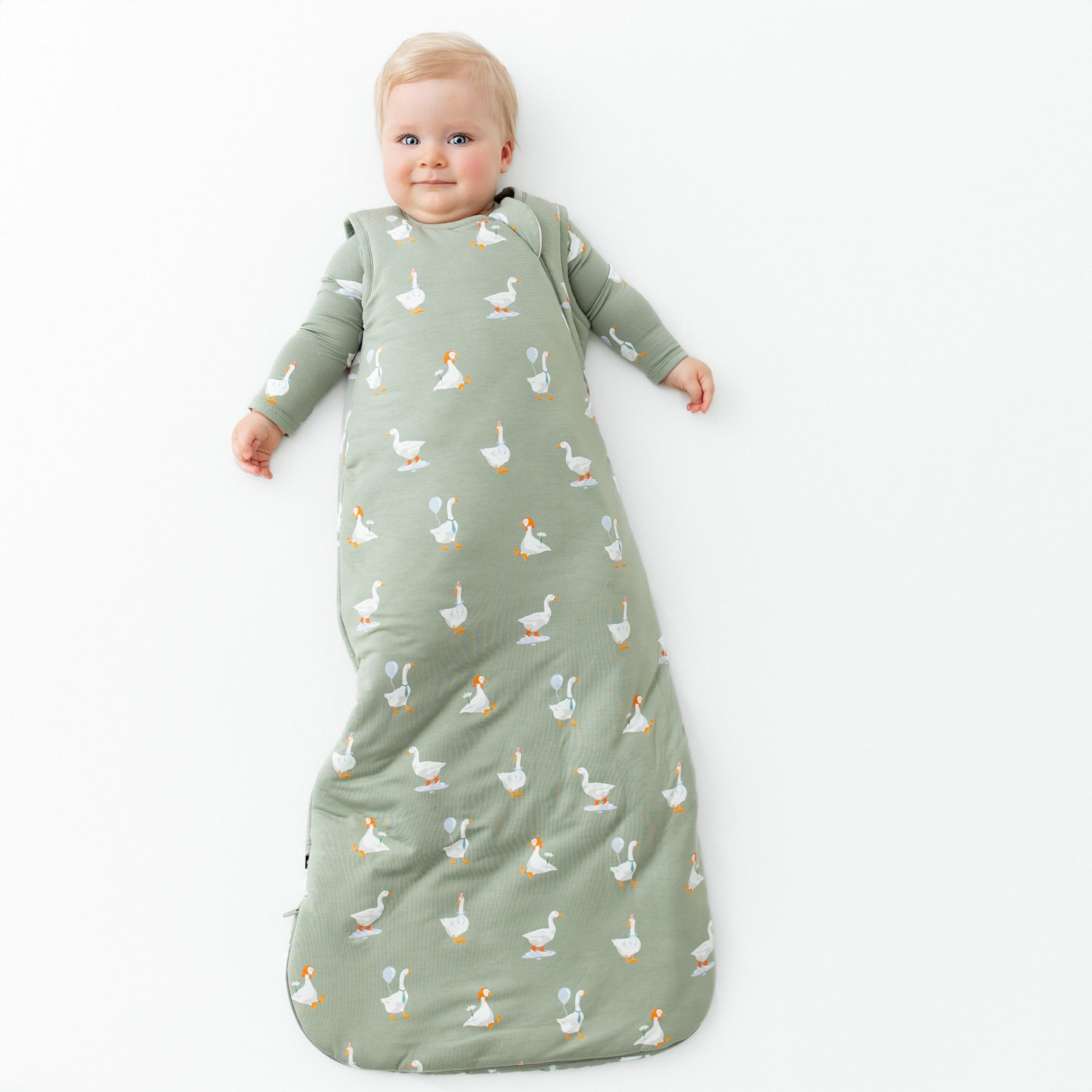 Infant wearing Sleep Bag in Silly Goose 2.5 with long sleeve pajamas