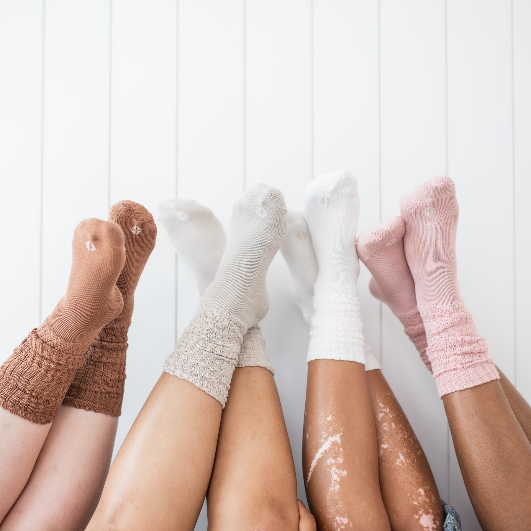 Adult Scrunch Socks in Cloud, Blush, Oat and Latte shown on models