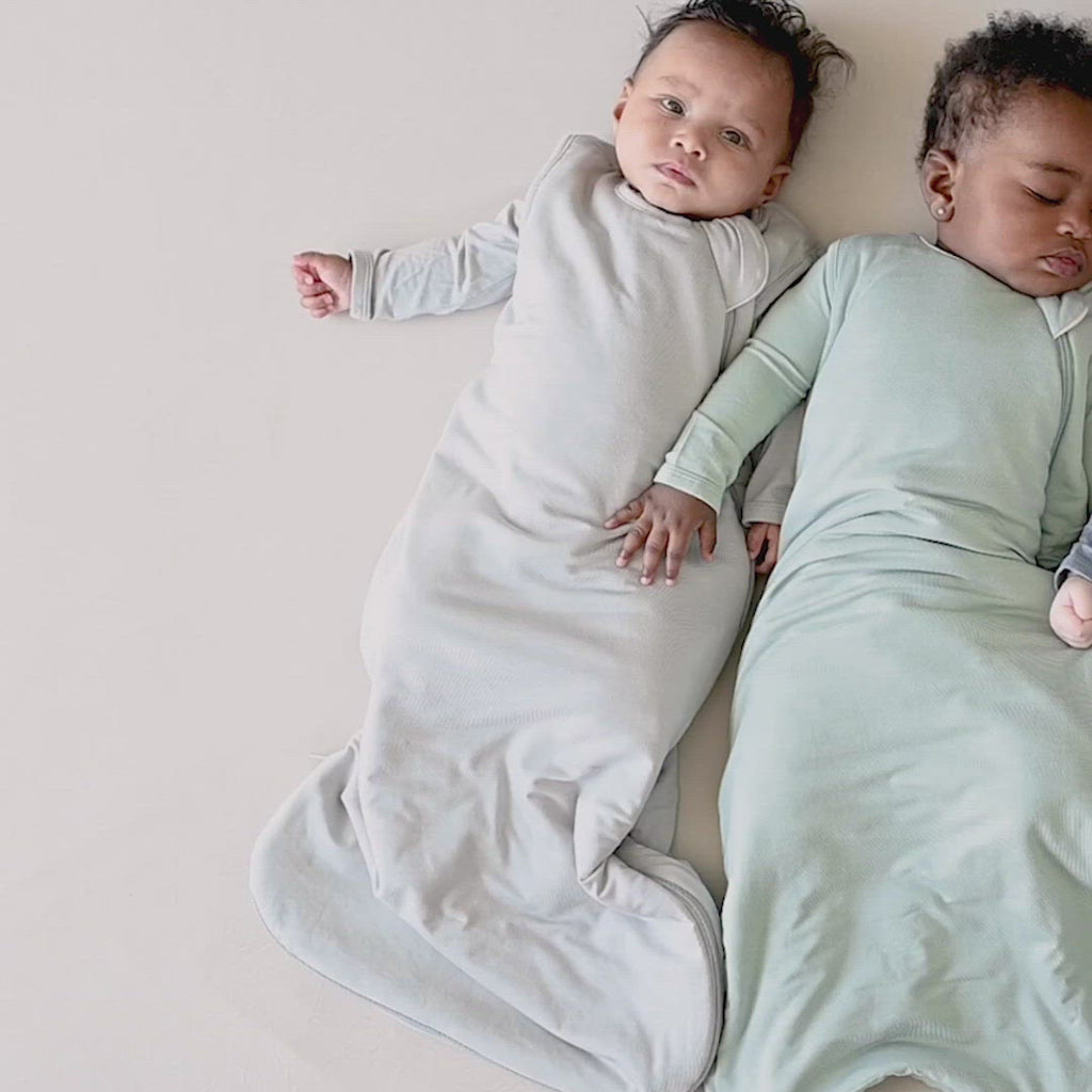 Video of baby wearing Kyte Baby Sleep Bag 1.0 in Storm Gray