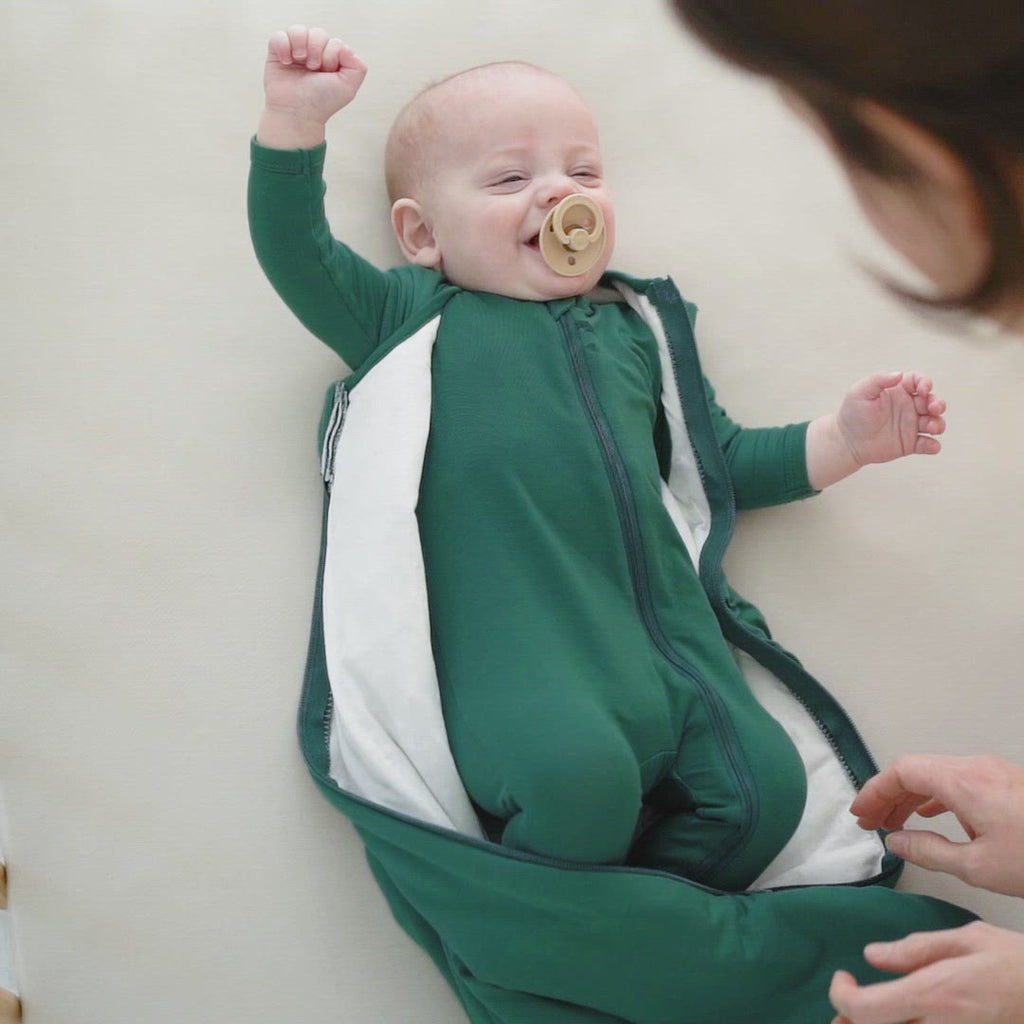 Video of baby wearing Kyte Baby Sleep Bag in Emerald 2.5