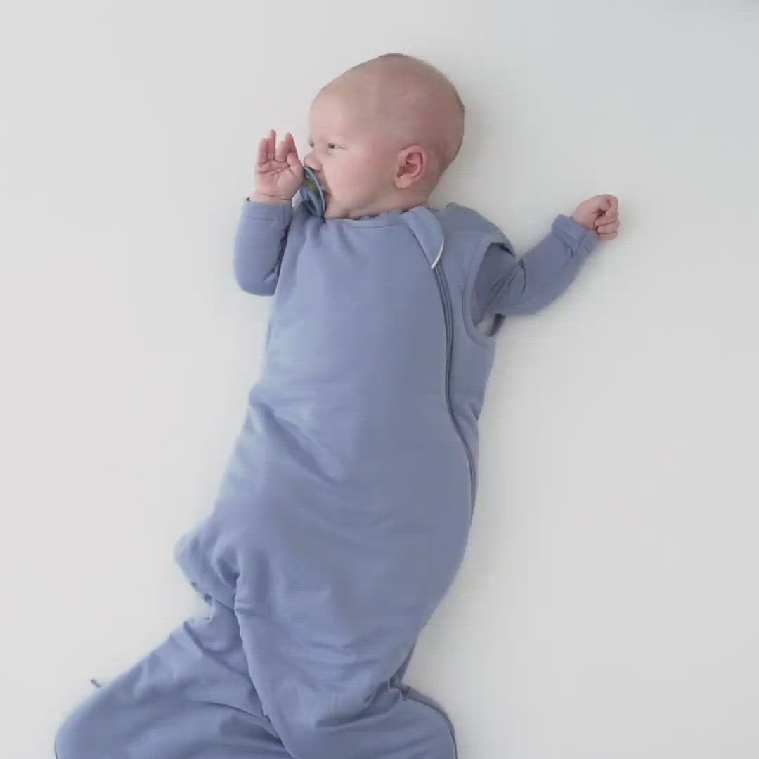Video of baby wearing Kyte Baby Sleep Bag in Slate 1.0