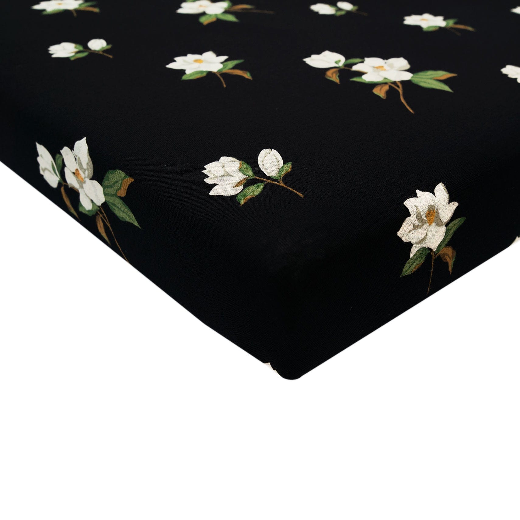 Kyte Baby Crib Sheet in black with big magnolia pattern