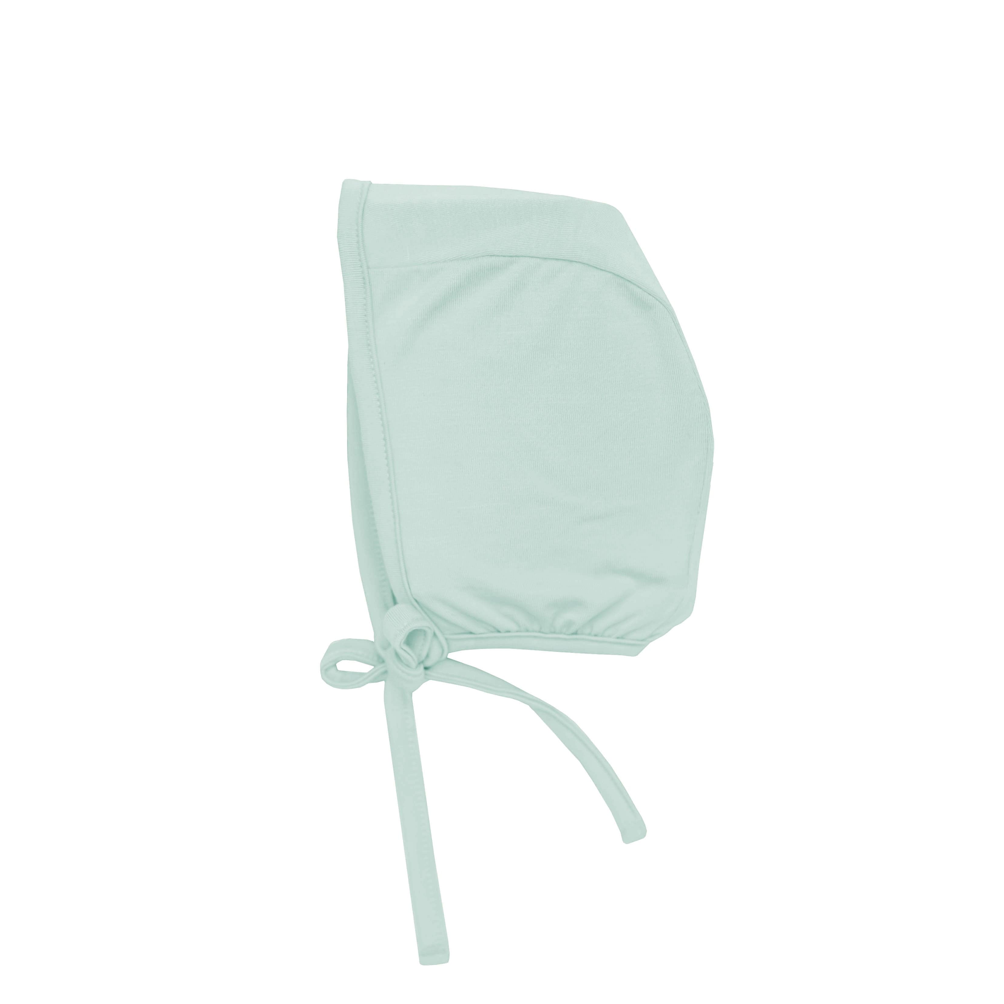 Flat lay of Kyte Baby Bonnet in Sage