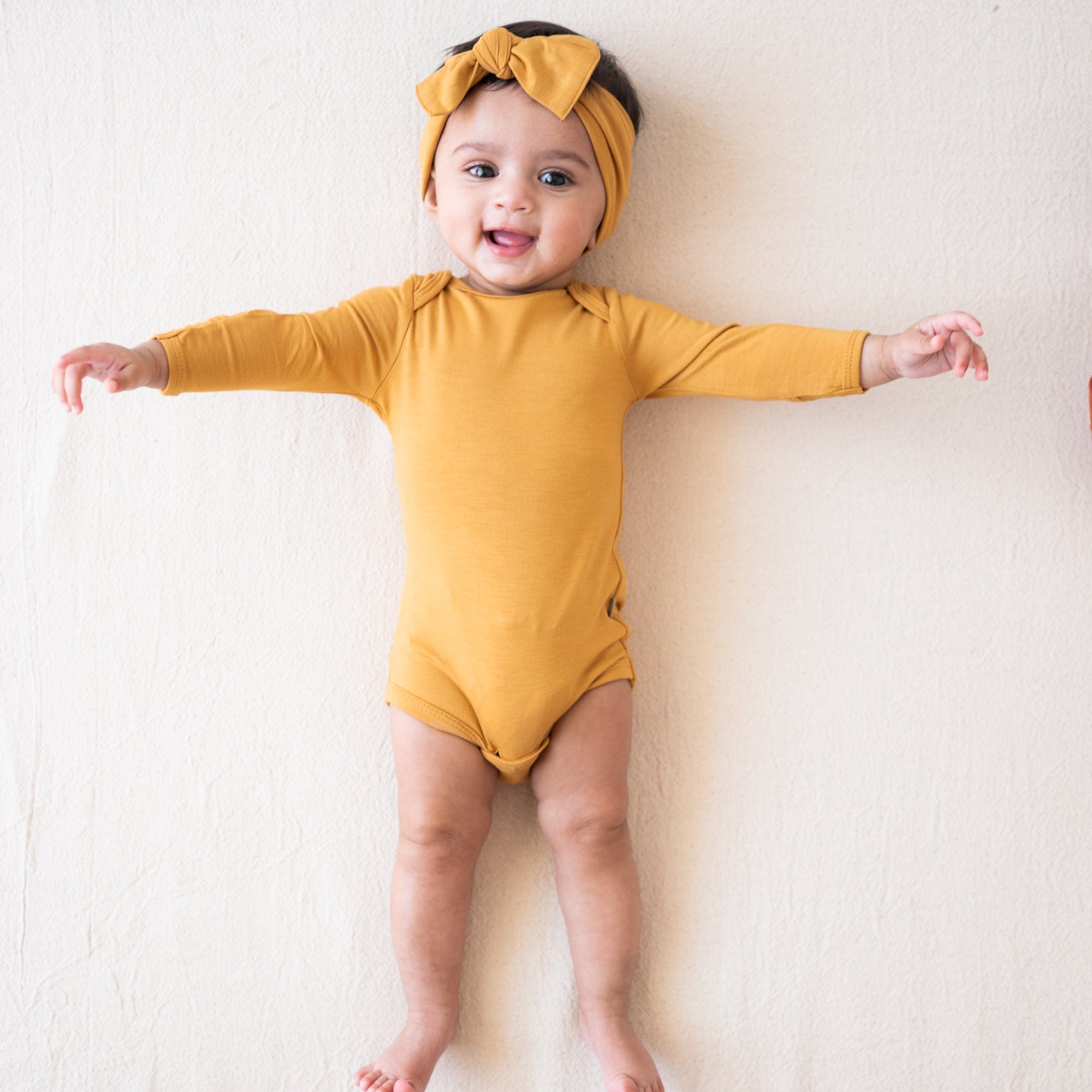 Kyte BABY Long Sleeve Bodysuits Long Sleeve Bodysuit in Marigold