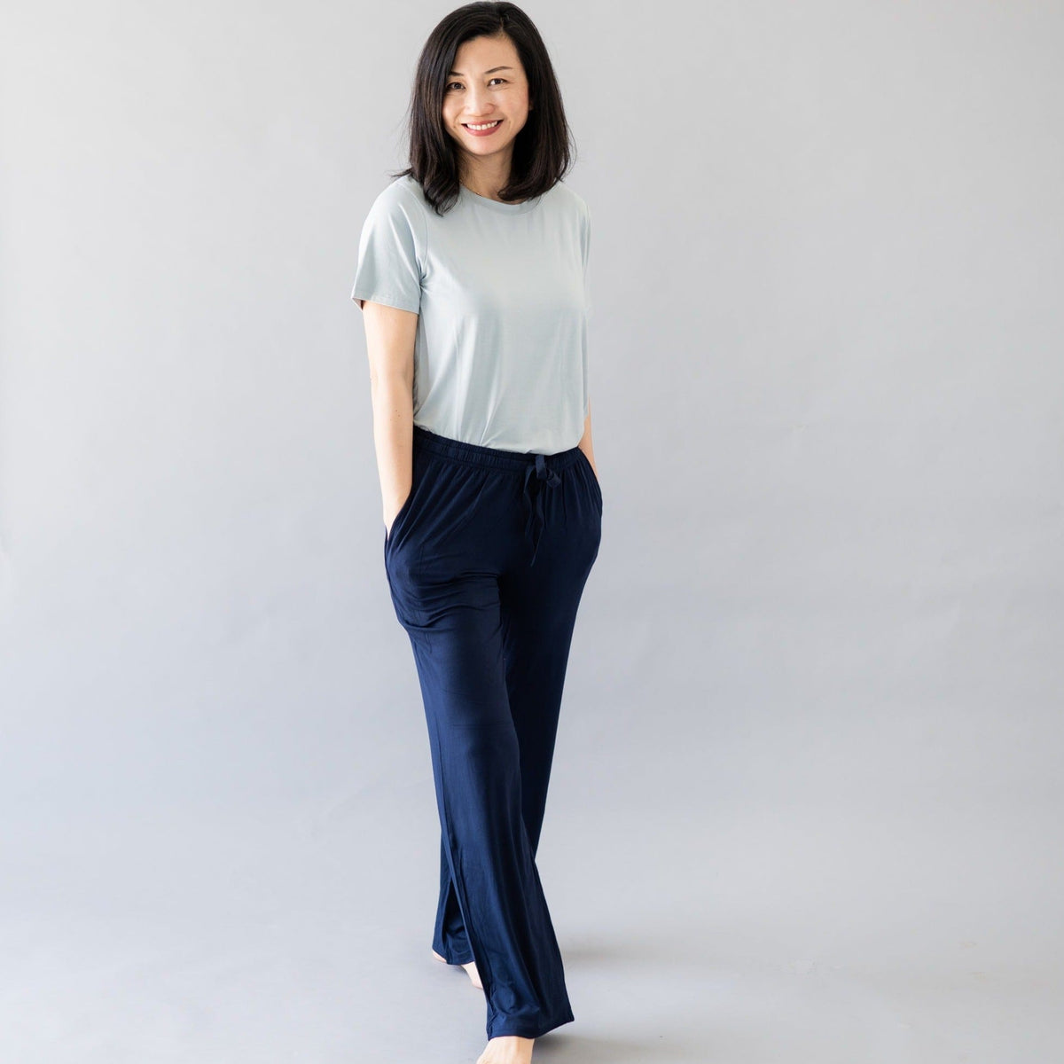 Woman wearing Kyte Baby Women's Lounge Pants in Navy