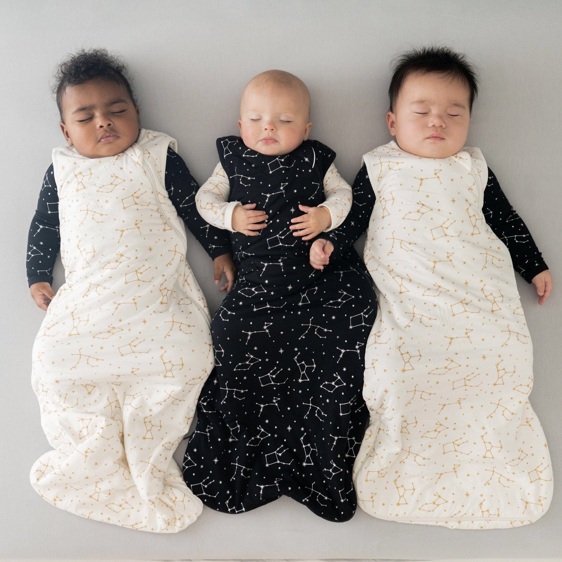 Babies wearing Kyte Baby sleep bags TOG 1.0