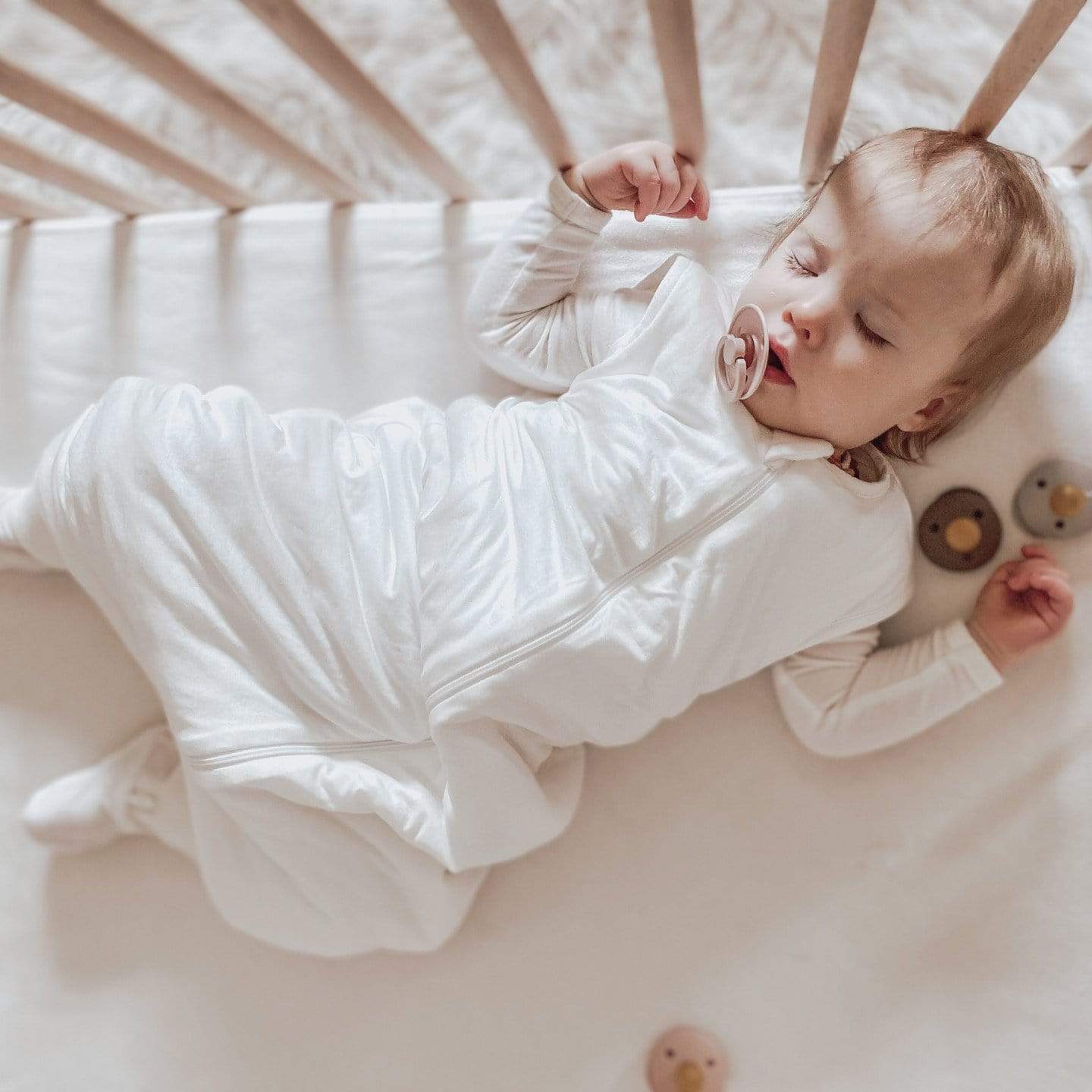 Toddler wearing Kyte Baby Sleep Bag Walker in Cloud 2.5