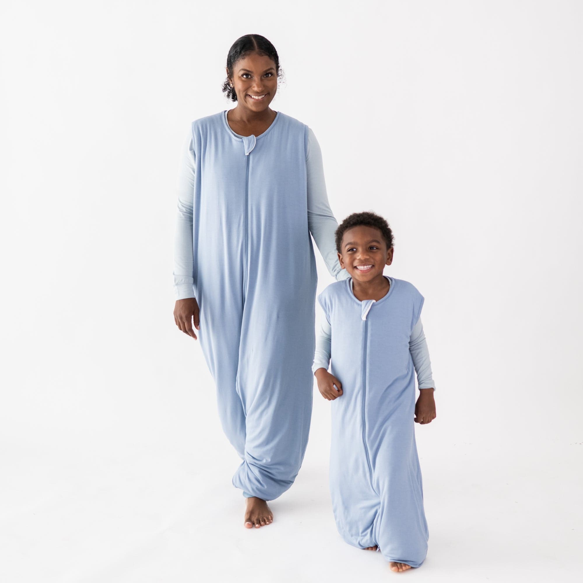 Mom and son in matching Kyte Baby TOG 1.0 bamboo Sleep Bag Walkers in Slate blue