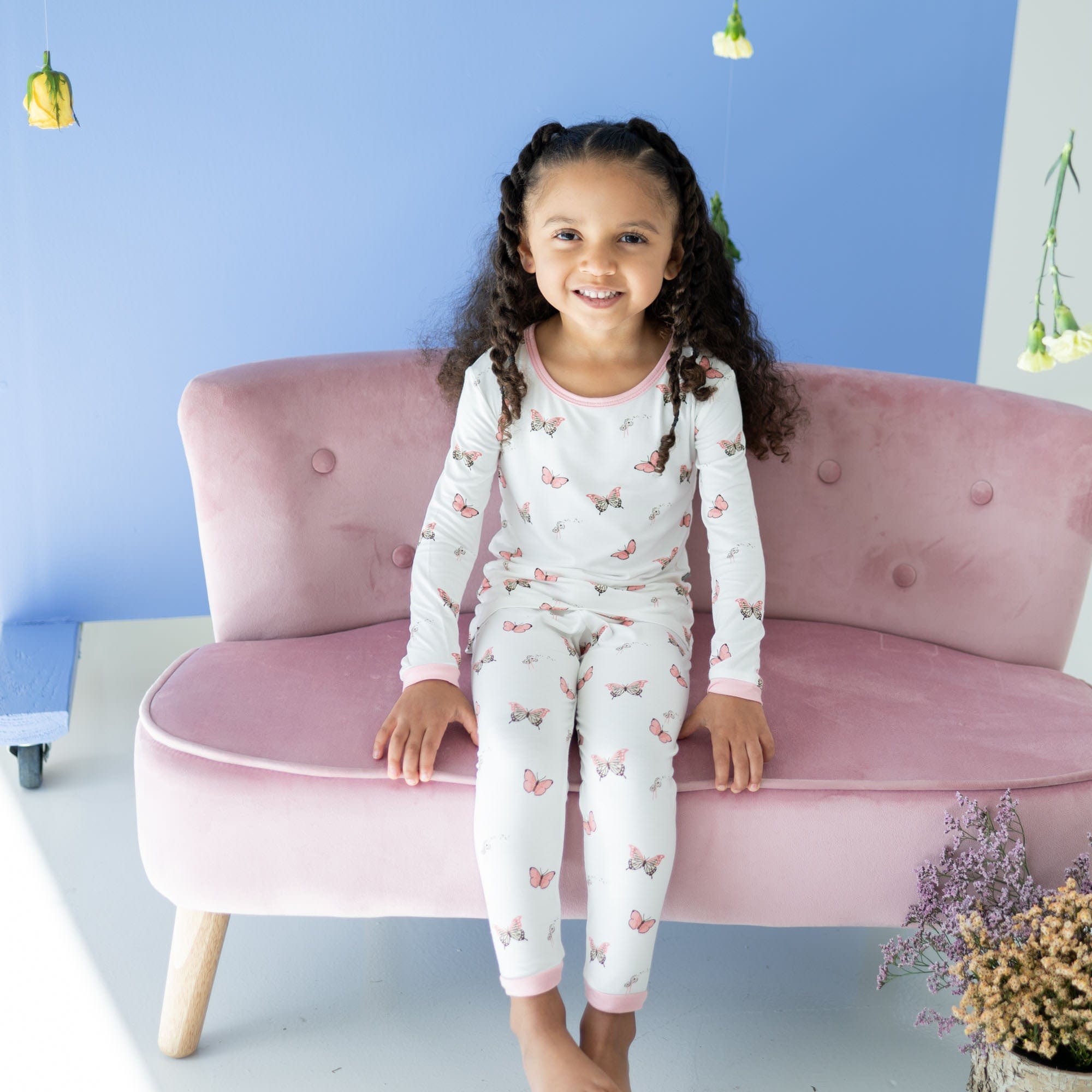 Toddler wearing Kyte Baby Long Sleeve Pajamas in Butterfly