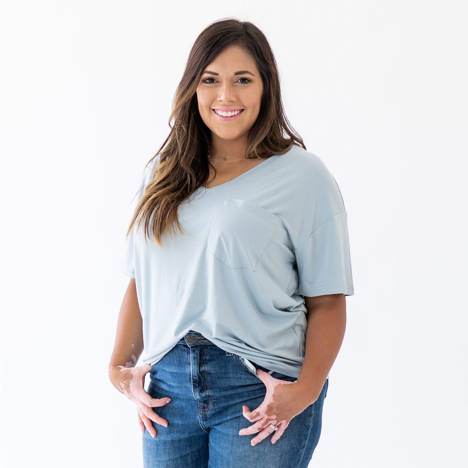 Woman wearing Kyte Baby Women's Relaxed Fit V-Neck in Fog
